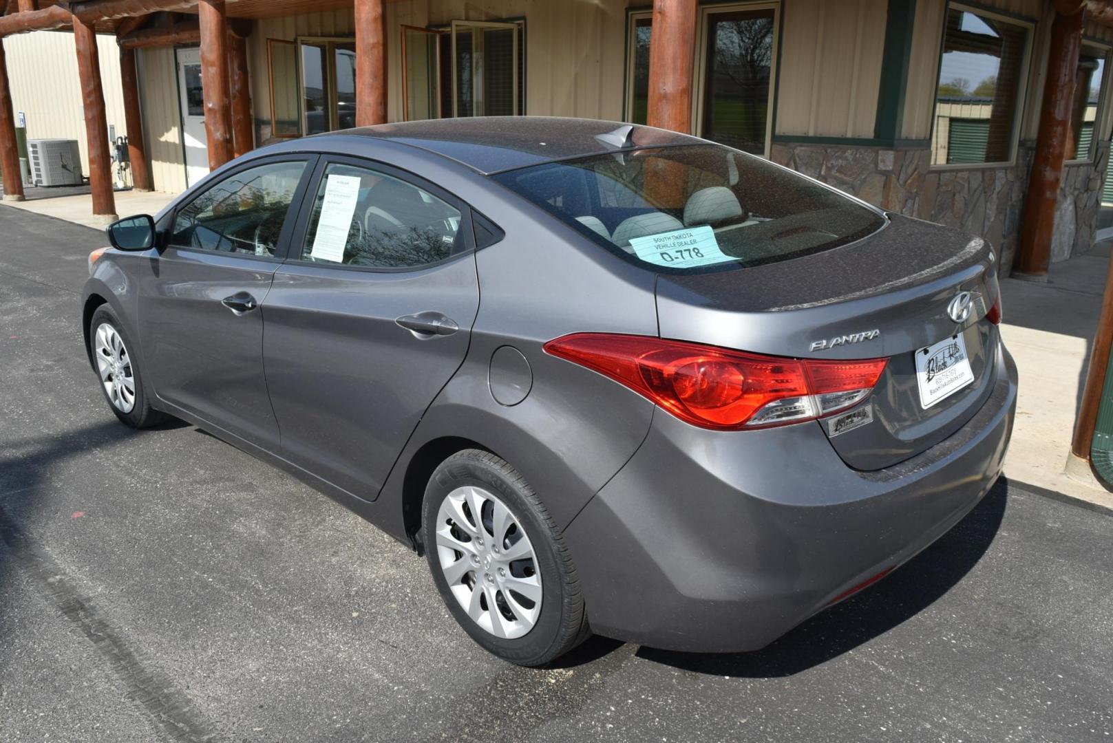 2012 Black /Beige Hyundai Elantra GLS (5NPDH4AE0CH) with an 1.8L 4 Cyl. engine, 6-Speed Automatic transmission, located at 1600 E Hwy 44, Rapid City, SD, 57703, (605) 716-7878, 44.070232, -103.171410 - Photo#5