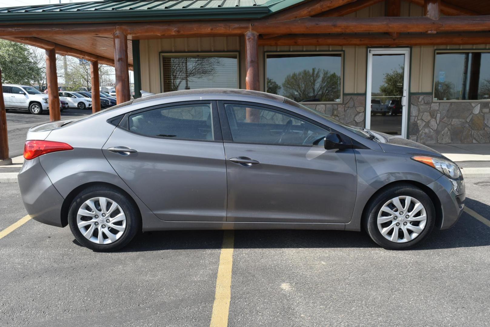 2012 Black /Beige Hyundai Elantra GLS (5NPDH4AE0CH) with an 1.8L 4 Cyl. engine, 6-Speed Automatic transmission, located at 1600 E Hwy 44, Rapid City, SD, 57703, (605) 716-7878, 44.070232, -103.171410 - Photo#4