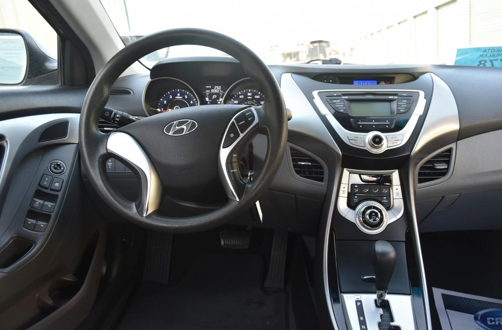 2012 Black /Beige Hyundai Elantra GLS (5NPDH4AE0CH) with an 1.8L 4 Cyl. engine, 6-Speed Automatic transmission, located at 1600 E Hwy 44, Rapid City, SD, 57703, (605) 716-7878, 44.070232, -103.171410 - Photo#12