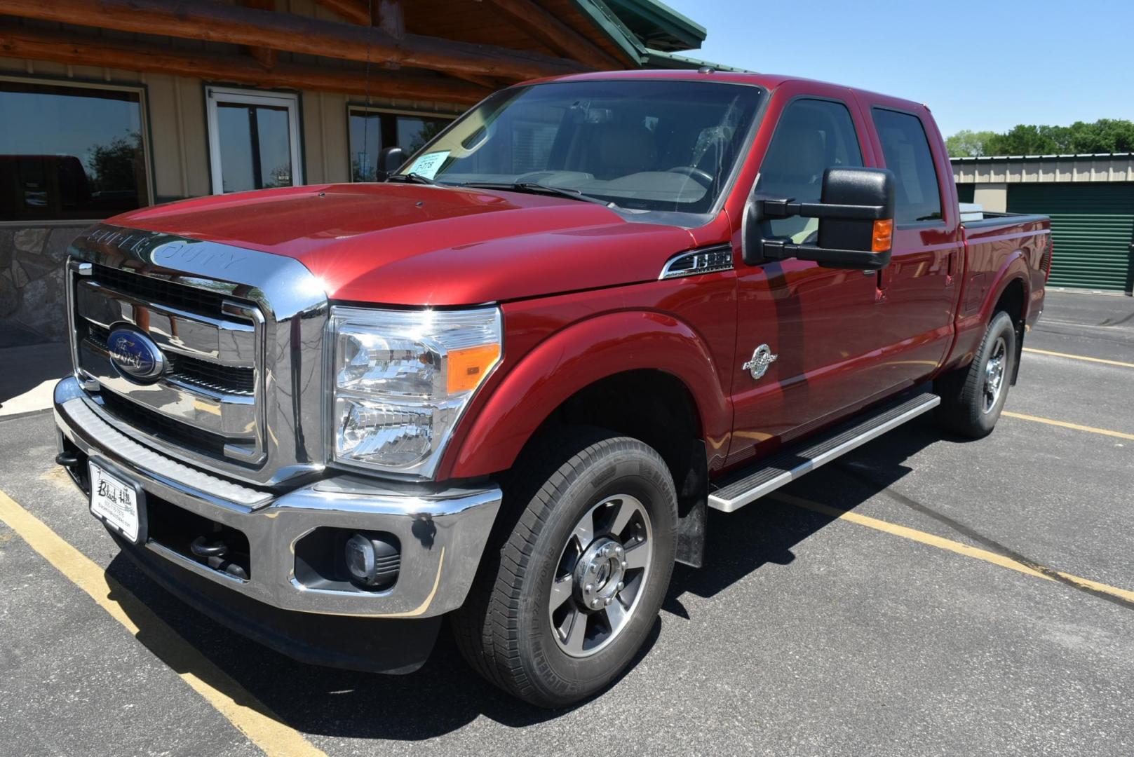 2016 Red /Tan Ford F-250 Super-Duty Lariet (1FT7W2BT2GE) with an 6.7L POWER STROKE V8 TURBO DIESEL engine, Torqshift 6-Speed Auto w/OD transmission, located at 1600 E Hwy 44, Rapid City, SD, 57703, (605) 716-7878, 44.070232, -103.171410 - Photo#2