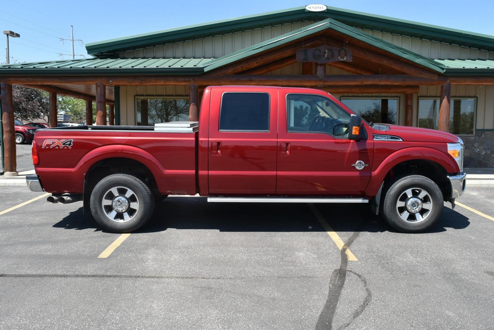 2016 Red /Tan Ford F-250 Super-Duty Lariet (1FT7W2BT2GE) with an 6.7L POWER STROKE V8 TURBO DIESEL engine, Torqshift 6-Speed Auto w/OD transmission, located at 1600 E Hwy 44, Rapid City, SD, 57703, (605) 716-7878, 44.070232, -103.171410 - Photo#4