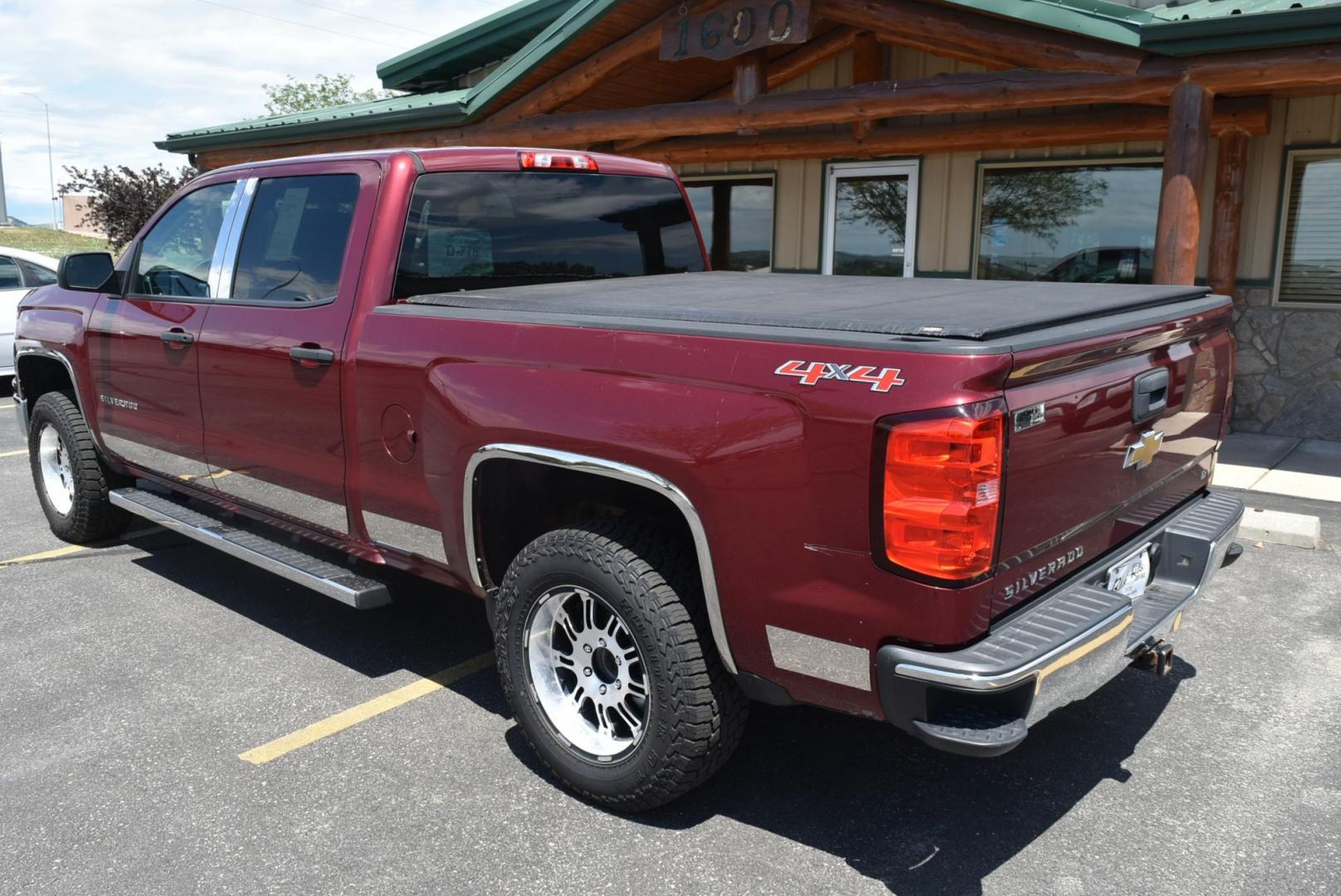 1999 Maroon /Black Chevrolet Silverado 1500 LT (3GCUKREC4EG) with an 5.3L ECOTEC3 V8 With Active Fuel Management, Direct Injection And Variable Valve Timing engine, 6-Speed Automatic, Electronically Controlled transmission, located at 1600 E Hwy 44, Rapid City, SD, 57703, (605) 716-7878, 44.070232, -103.171410 - Photo#5