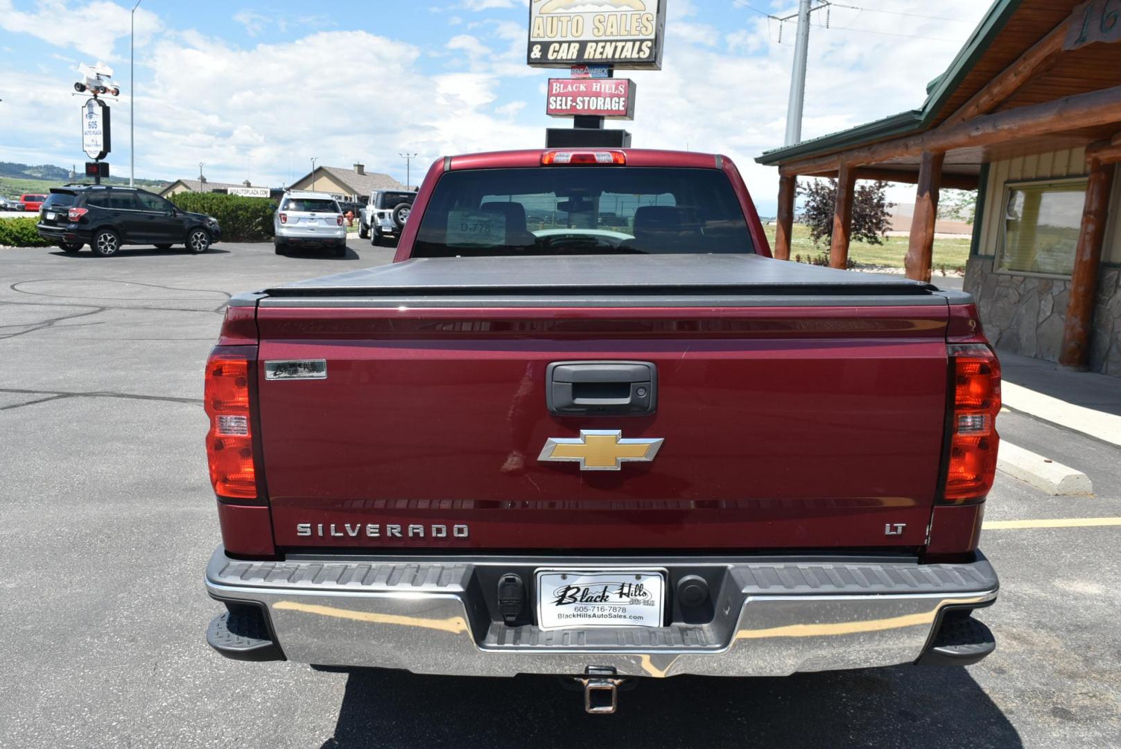 1999 Maroon /Black Chevrolet Silverado 1500 LT (3GCUKREC4EG) with an 5.3L ECOTEC3 V8 With Active Fuel Management, Direct Injection And Variable Valve Timing engine, 6-Speed Automatic, Electronically Controlled transmission, located at 1600 E Hwy 44, Rapid City, SD, 57703, (605) 716-7878, 44.070232, -103.171410 - Photo#6