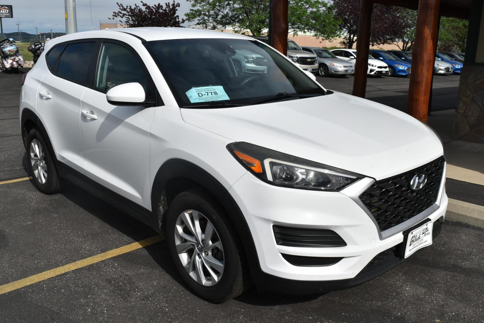 2019 White Hyundai Tucson SE (KM8J2CA4XKU) with an 2.0 L Regular Unleaded I-4 engine, 6 -Speed Automatic w/OD transmission, located at 1600 E Hwy 44, Rapid City, SD, 57703, (605) 716-7878, 44.070232, -103.171410 - Photo#1