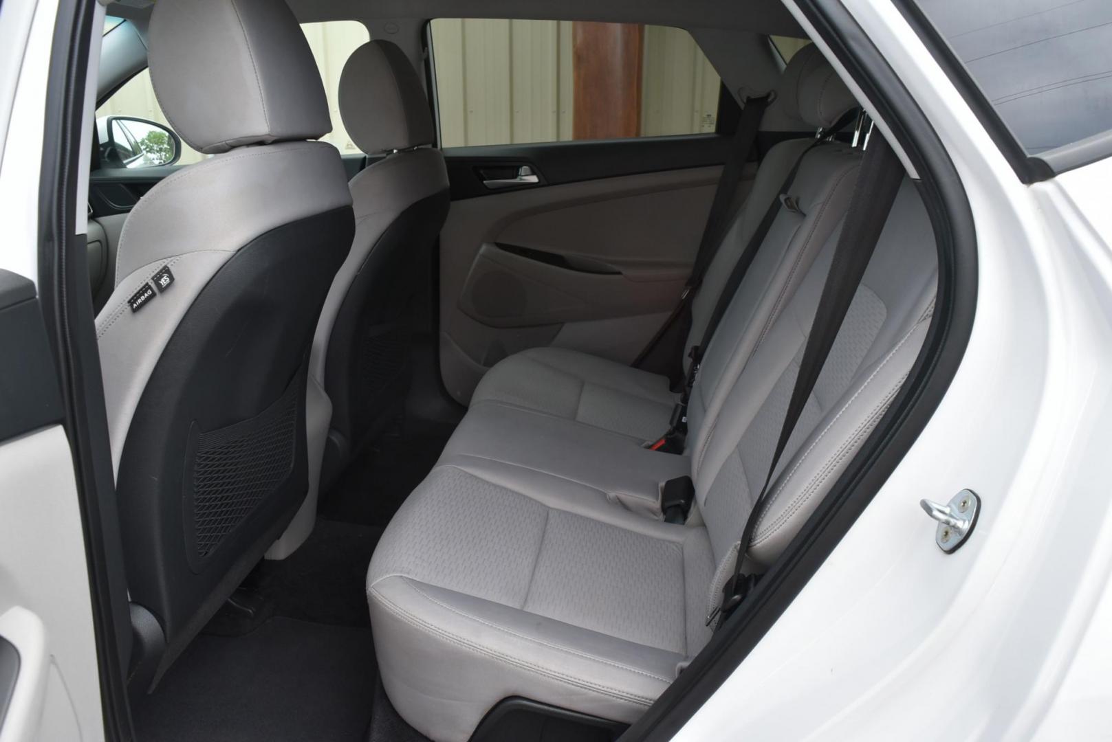 2019 White Hyundai Tucson SE (KM8J2CA4XKU) with an 2.0 L Regular Unleaded I-4 engine, 6 -Speed Automatic w/OD transmission, located at 1600 E Hwy 44, Rapid City, SD, 57703, (605) 716-7878, 44.070232, -103.171410 - Photo#10