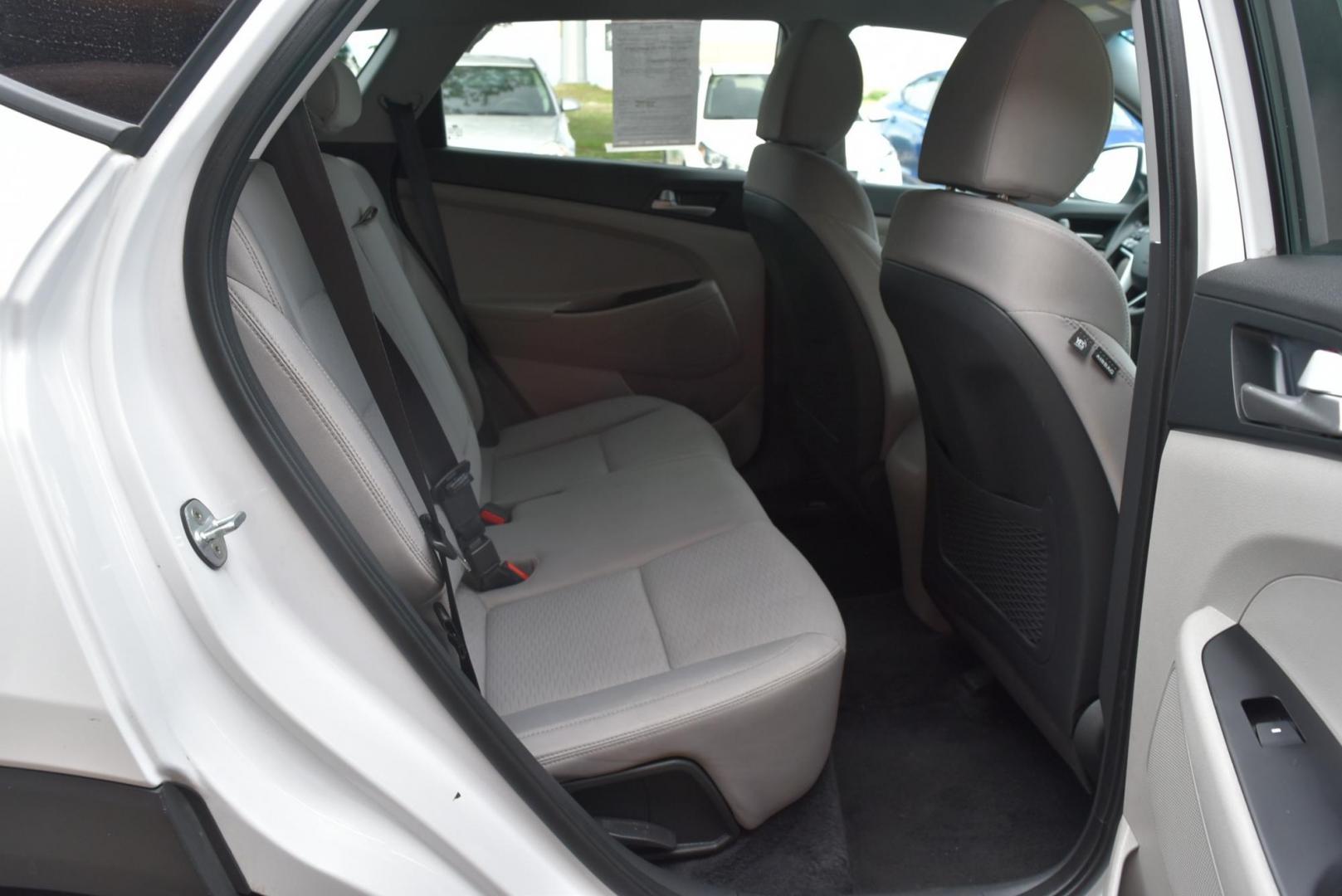 2019 White Hyundai Tucson SE (KM8J2CA4XKU) with an 2.0 L Regular Unleaded I-4 engine, 6 -Speed Automatic w/OD transmission, located at 1600 E Hwy 44, Rapid City, SD, 57703, (605) 716-7878, 44.070232, -103.171410 - Photo#11