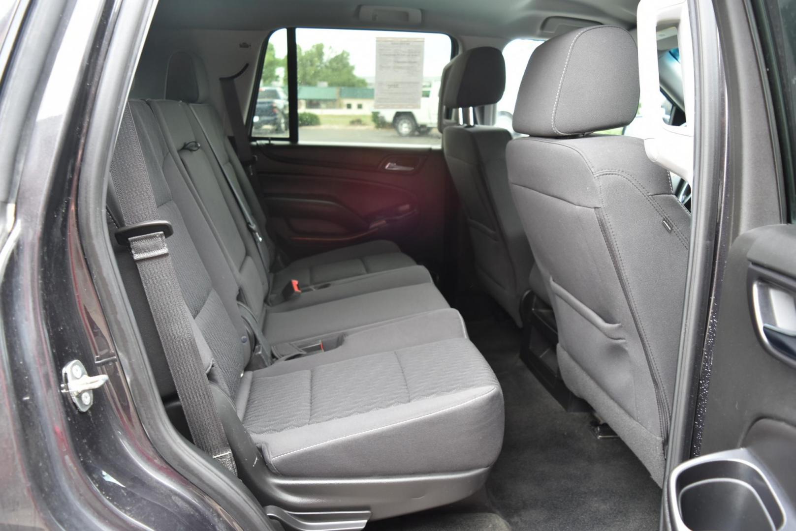 2018 Gray /Black Chevrolet Tahoe LS (1GNSKAECXJR) with an 5.3L V8 OHV 16V engine, 6-Speed Automatic transmission, located at 1600 E Hwy 44, Rapid City, SD, 57703, (605) 716-7878, 44.070232, -103.171410 - Photo#11