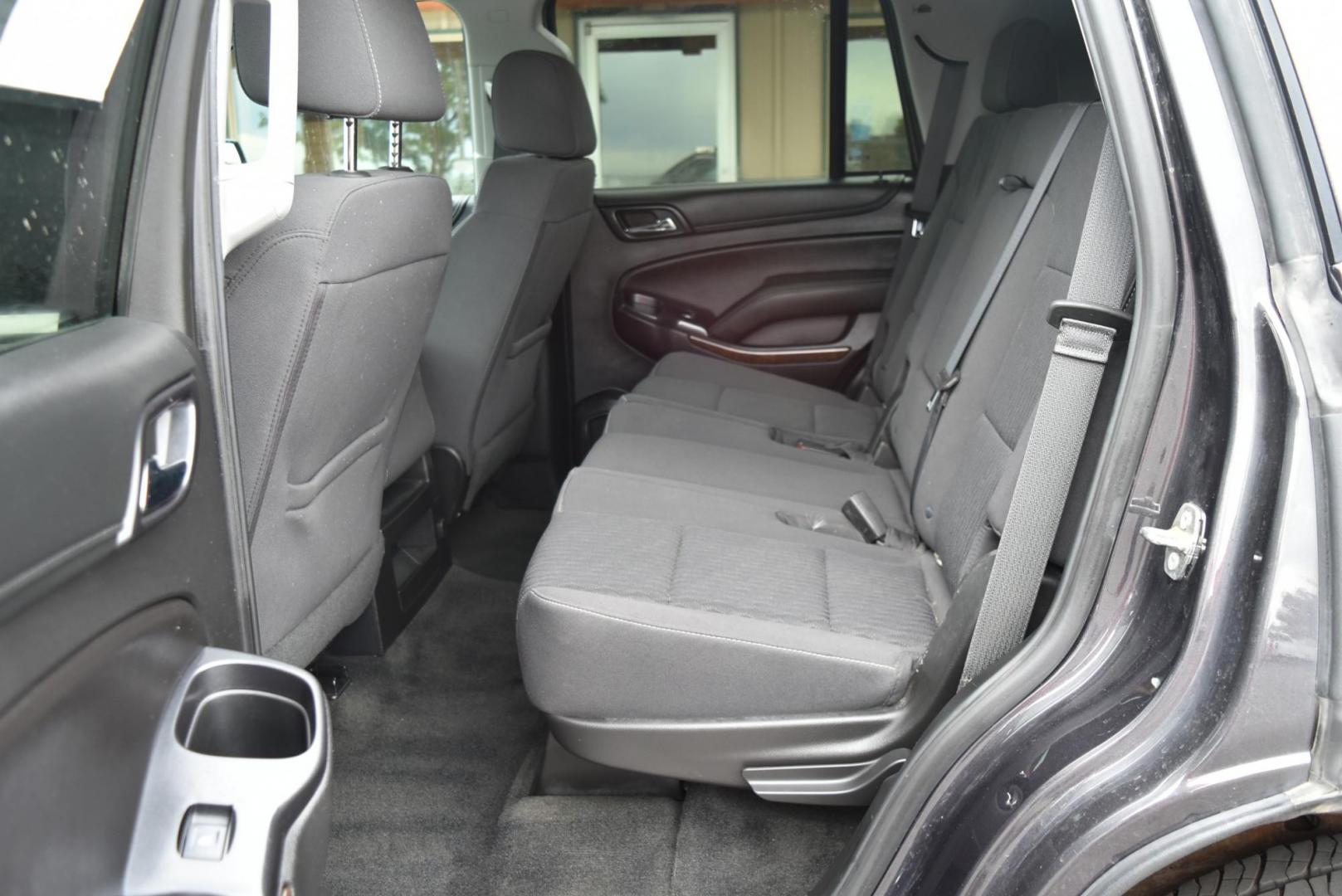2018 Gray /Black Chevrolet Tahoe LS (1GNSKAECXJR) with an 5.3L V8 OHV 16V engine, 6-Speed Automatic transmission, located at 1600 E Hwy 44, Rapid City, SD, 57703, (605) 716-7878, 44.070232, -103.171410 - Photo#12