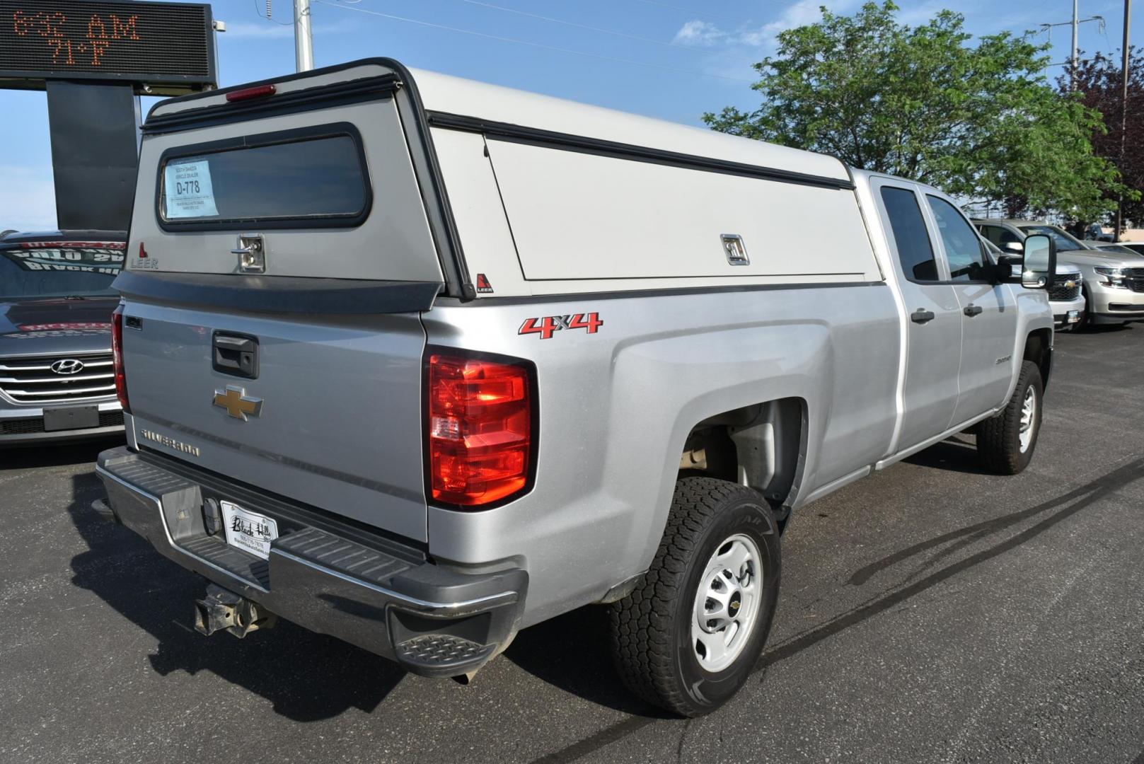 2019 Silver /gray Chevrolet Silverado 2500HD Work Truck Double Cab 4WD (2GC2KREG7K1) with an VORTEC 6.0L VARIABLE VALVE TIMING V8 SFI engine, 6-Speed Automatic, Heavy-Duty, Electronically Controlled transmission, located at 1600 E Hwy 44, Rapid City, SD, 57703, (605) 716-7878, 44.070232, -103.171410 - Photo#5
