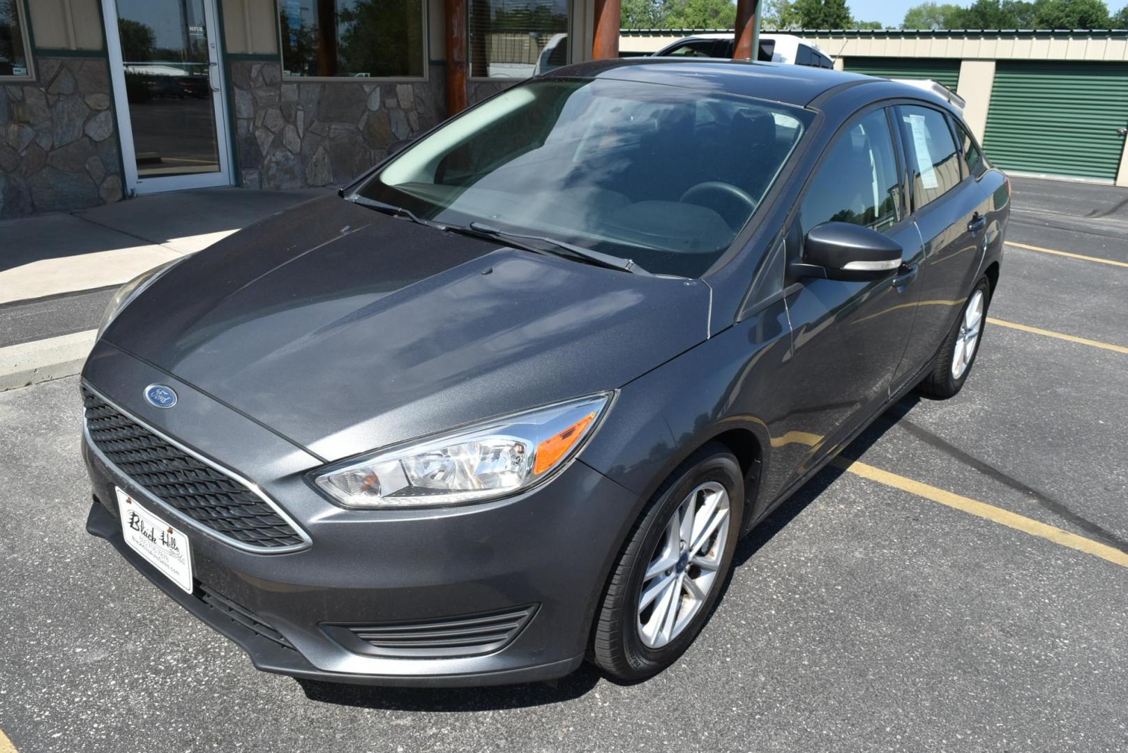 2017 Gray /Black Ford Focus SE Sedan (1FADP3F25HL) with an 2.0L L4 DOHC 16V engine, located at 1600 E Hwy 44, Rapid City, SD, 57703, (605) 716-7878, 44.070232, -103.171410 - Photo#0