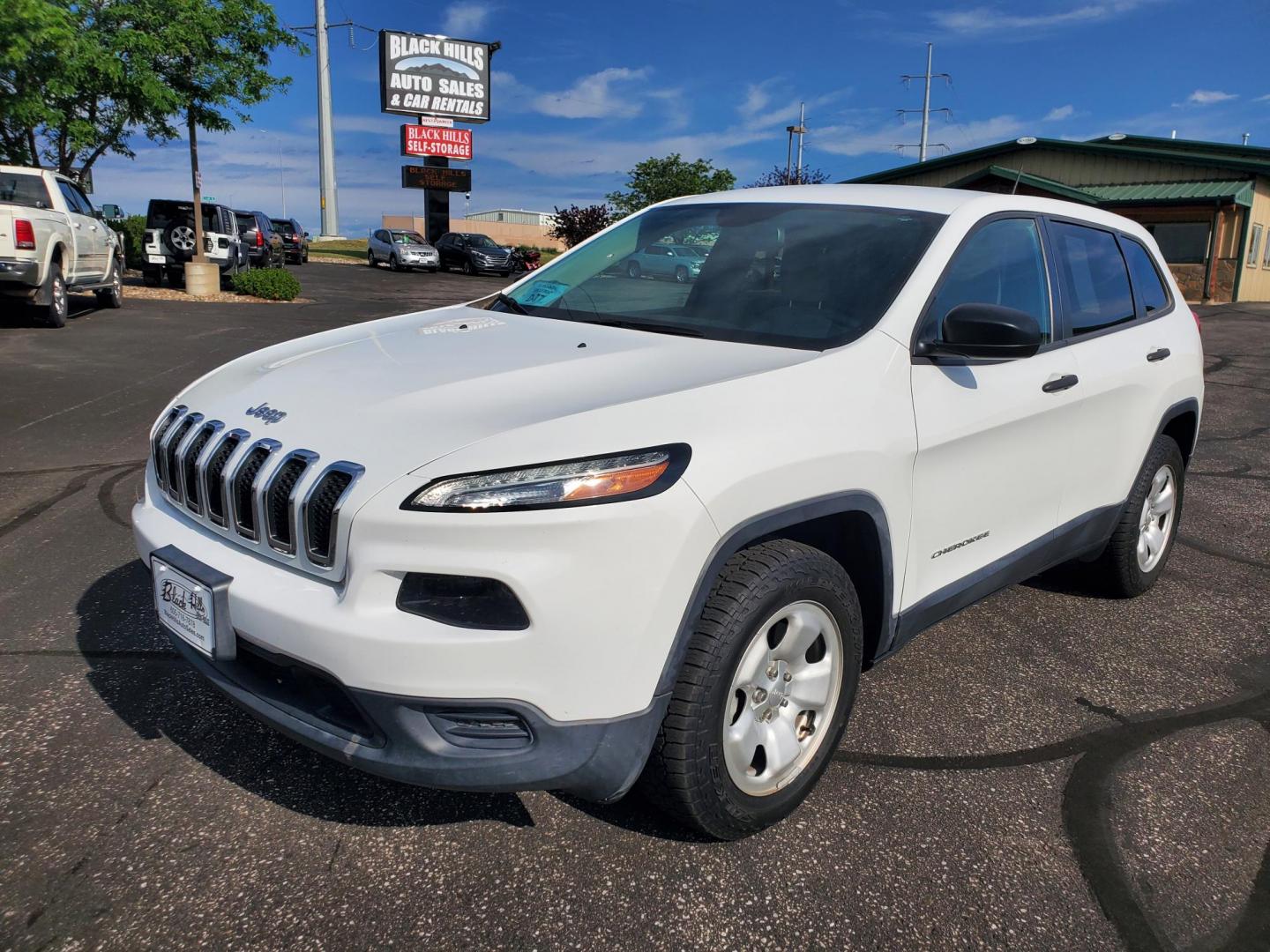 2016 White /Tan Jeep Cherokee Sport 4WD (1C4PJMAB2GW) with an 2.4L L4 DOHC 16V engine, 9-Speed Automatic transmission, located at 1600 E Hwy 44, Rapid City, SD, 57703, (605) 716-7878, 44.070232, -103.171410 - Photo#0