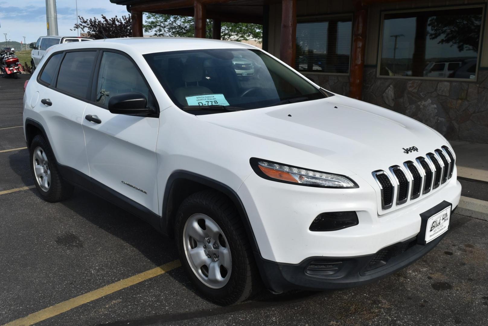 2016 White /Tan Jeep Cherokee Sport 4WD (1C4PJMAB2GW) with an 2.4L L4 DOHC 16V engine, 9-Speed Automatic transmission, located at 1600 E Hwy 44, Rapid City, SD, 57703, (605) 716-7878, 44.070232, -103.171410 - Photo#1