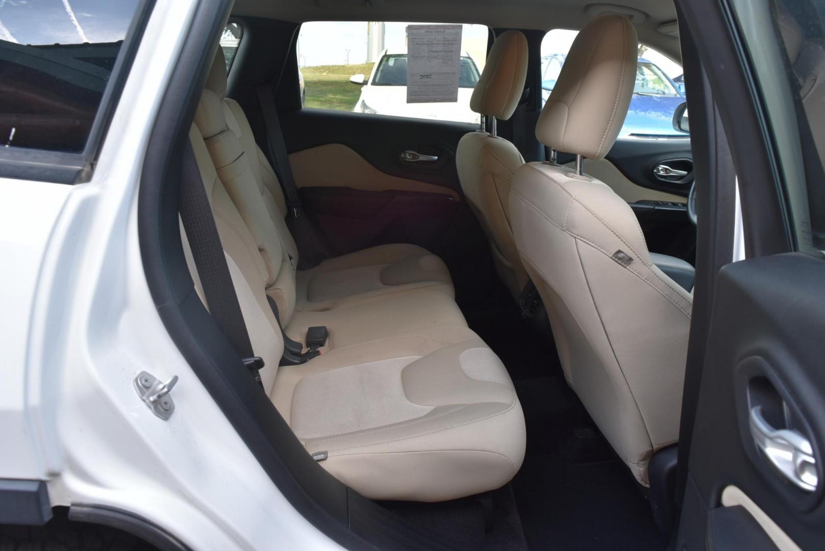2016 White /Tan Jeep Cherokee Sport 4WD (1C4PJMAB2GW) with an 2.4L L4 DOHC 16V engine, 9-Speed Automatic transmission, located at 1600 E Hwy 44, Rapid City, SD, 57703, (605) 716-7878, 44.070232, -103.171410 - Photo#11