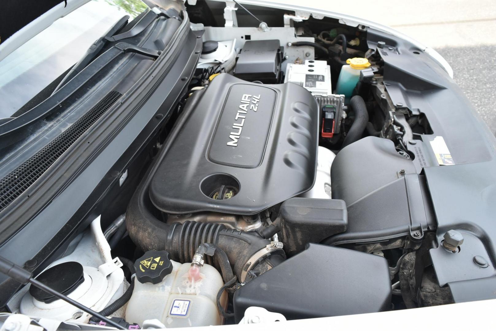 2016 White /Tan Jeep Cherokee Sport 4WD (1C4PJMAB2GW) with an 2.4L L4 DOHC 16V engine, 9-Speed Automatic transmission, located at 1600 E Hwy 44, Rapid City, SD, 57703, (605) 716-7878, 44.070232, -103.171410 - Photo#25