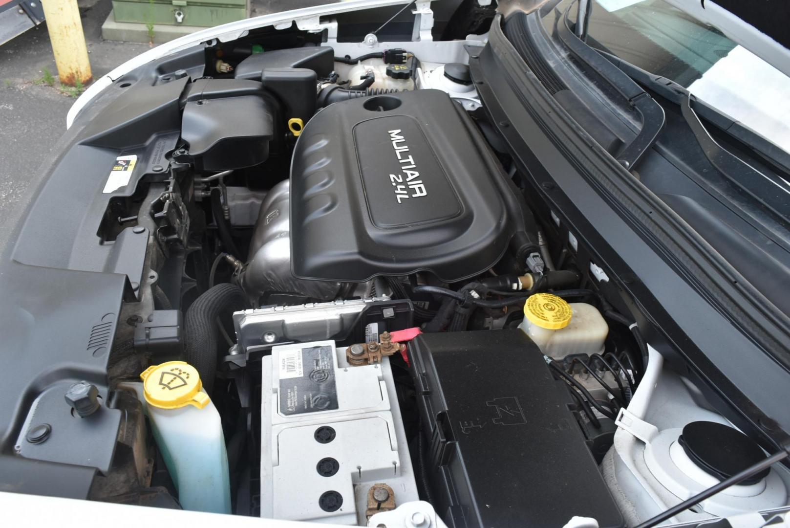 2016 White /Tan Jeep Cherokee Sport 4WD (1C4PJMAB2GW) with an 2.4L L4 DOHC 16V engine, 9-Speed Automatic transmission, located at 1600 E Hwy 44, Rapid City, SD, 57703, (605) 716-7878, 44.070232, -103.171410 - Photo#27