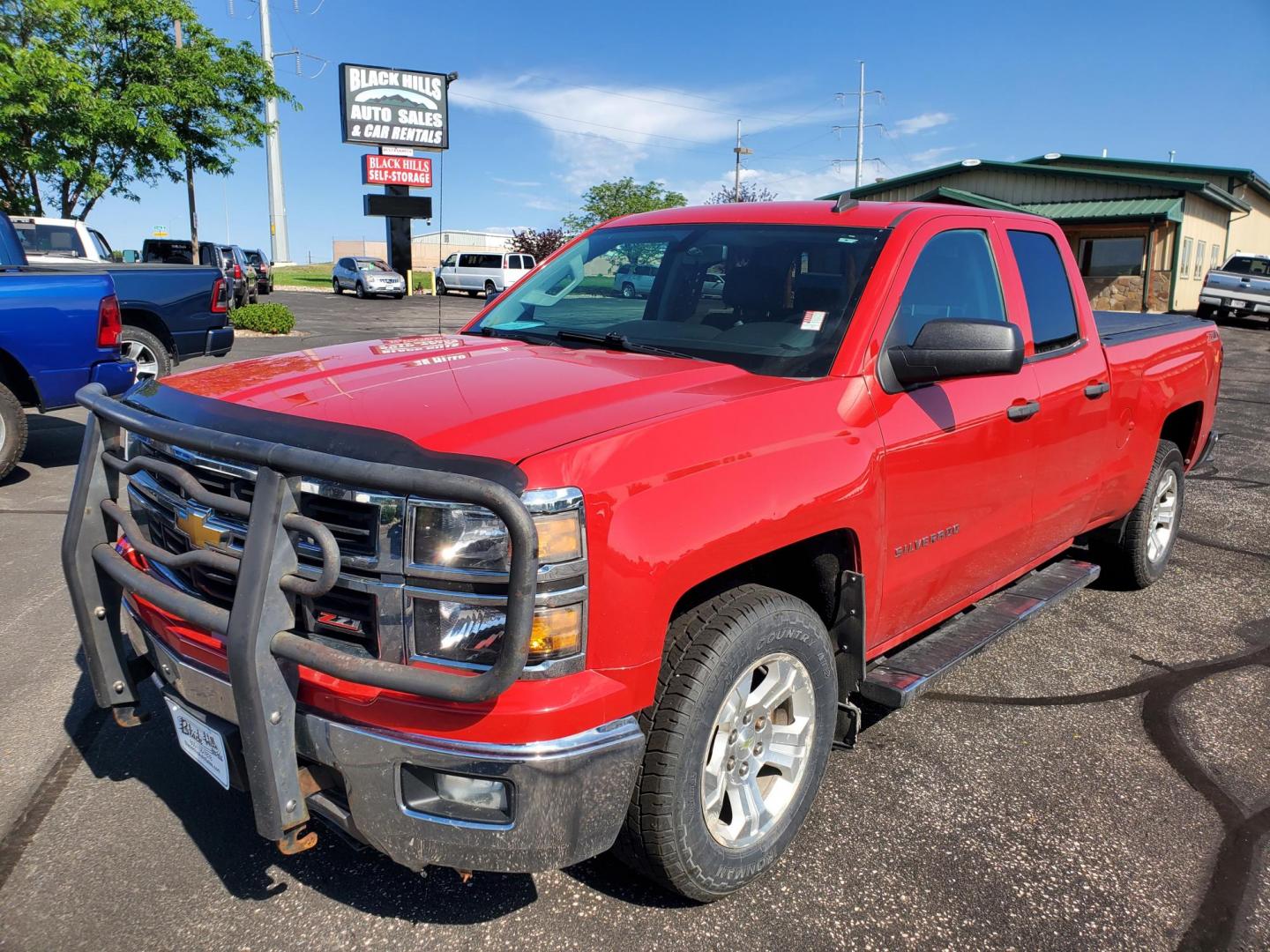2014 Red /black Chevrolet Silverado 1500 1LT Double Cab 4WD (1GCVKREC1EZ) with an 5.3L V8 OHV 16V engine, 6-Speed Automatic transmission, located at 1600 E Hwy 44, Rapid City, SD, 57703, (605) 716-7878, 44.070232, -103.171410 - very nice local trade in, Double cab with 4 doors - Photo#0