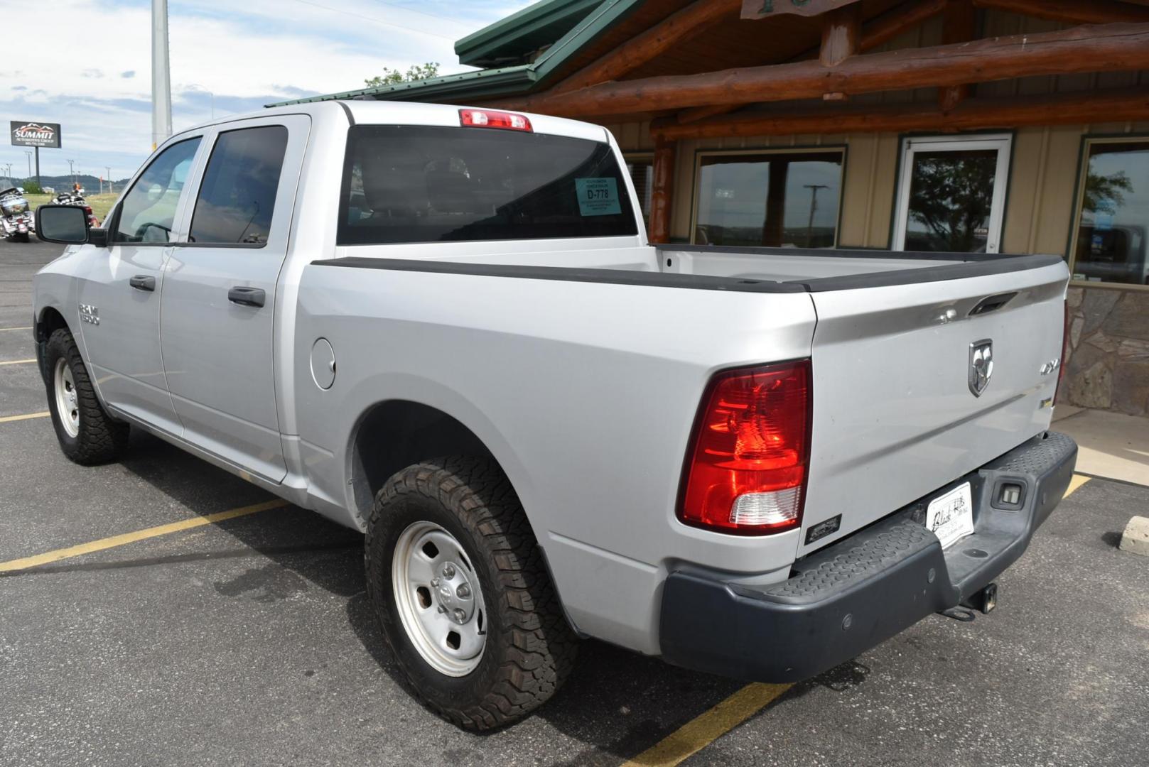 2014 Silver /black RAM 1500 Tradesman Crew Cab SWB 4WD (1C6RR7KG3ES) with an 3.6L V6 DOHC 24V FFV engine, 6-Speed Automatic transmission, located at 1600 E Hwy 44, Rapid City, SD, 57703, (605) 716-7878, 44.070232, -103.171410 - Photo#6