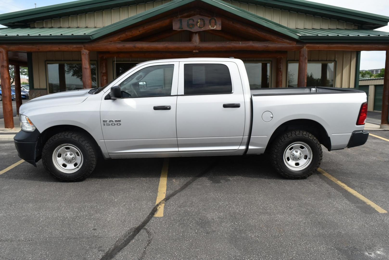 2014 Silver /black RAM 1500 Tradesman Crew Cab SWB 4WD (1C6RR7KG3ES) with an 3.6L V6 DOHC 24V FFV engine, 6-Speed Automatic transmission, located at 1600 E Hwy 44, Rapid City, SD, 57703, (605) 716-7878, 44.070232, -103.171410 - Photo#4