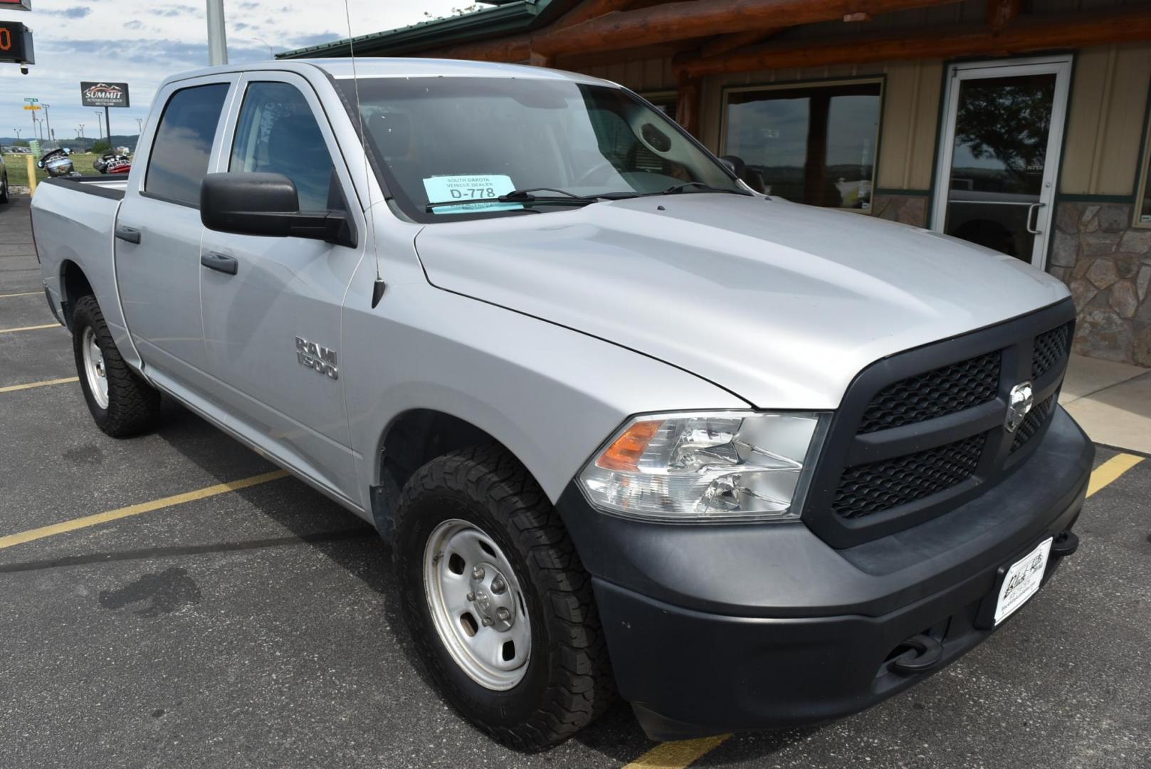 2014 Silver /black RAM 1500 Tradesman Crew Cab SWB 4WD (1C6RR7KG3ES) with an 3.6L V6 DOHC 24V FFV engine, 6-Speed Automatic transmission, located at 1600 E Hwy 44, Rapid City, SD, 57703, (605) 716-7878, 44.070232, -103.171410 - Photo#1
