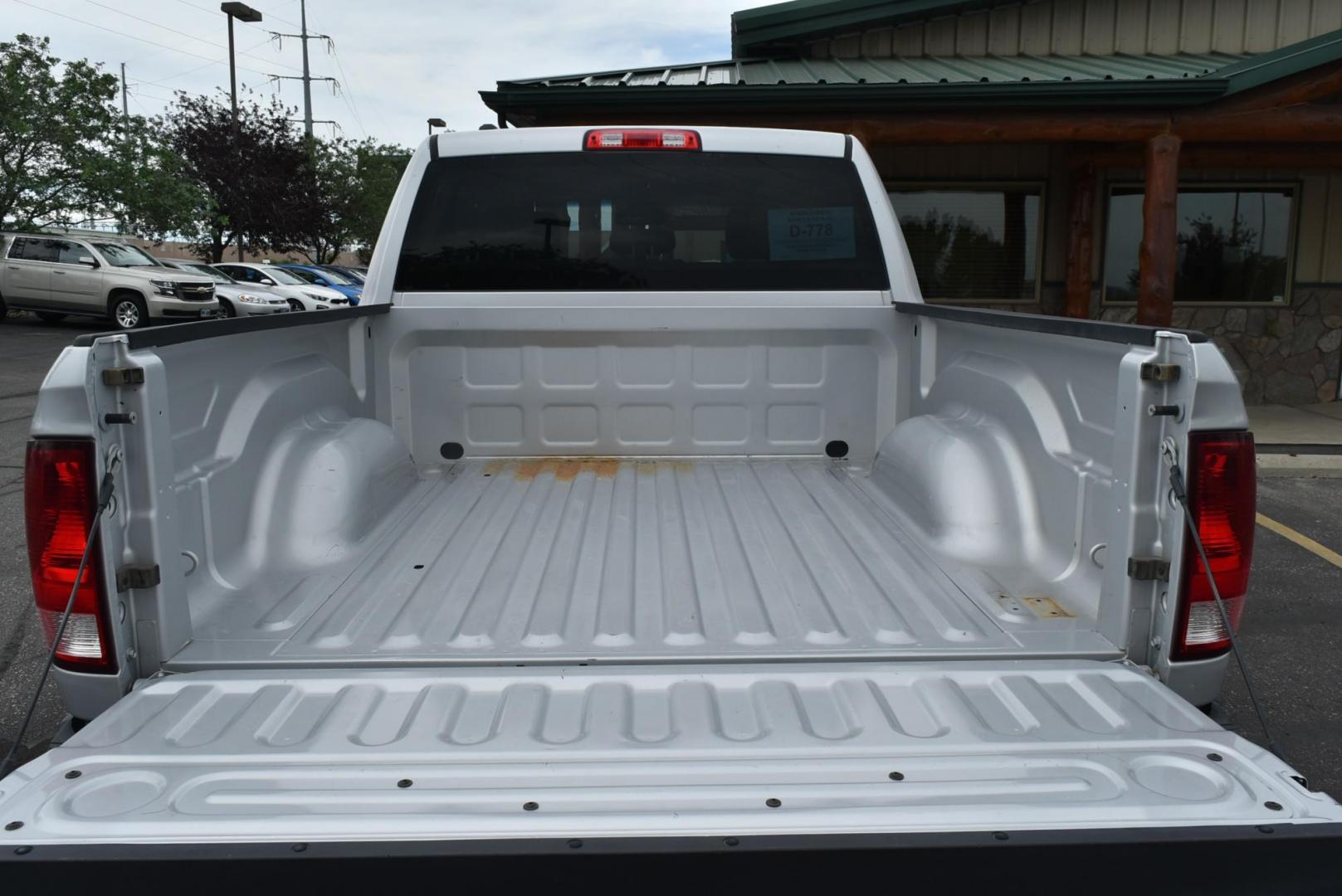 2014 Silver /black RAM 1500 Tradesman Crew Cab SWB 4WD (1C6RR7KG3ES) with an 3.6L V6 DOHC 24V FFV engine, 6-Speed Automatic transmission, located at 1600 E Hwy 44, Rapid City, SD, 57703, (605) 716-7878, 44.070232, -103.171410 - Photo#24
