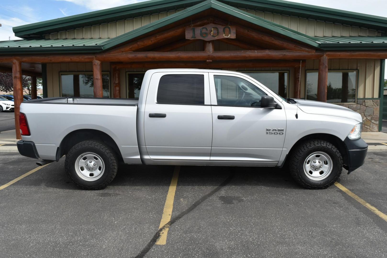2014 Silver /black RAM 1500 Tradesman Crew Cab SWB 4WD (1C6RR7KG3ES) with an 3.6L V6 DOHC 24V FFV engine, 6-Speed Automatic transmission, located at 1600 E Hwy 44, Rapid City, SD, 57703, (605) 716-7878, 44.070232, -103.171410 - Photo#5