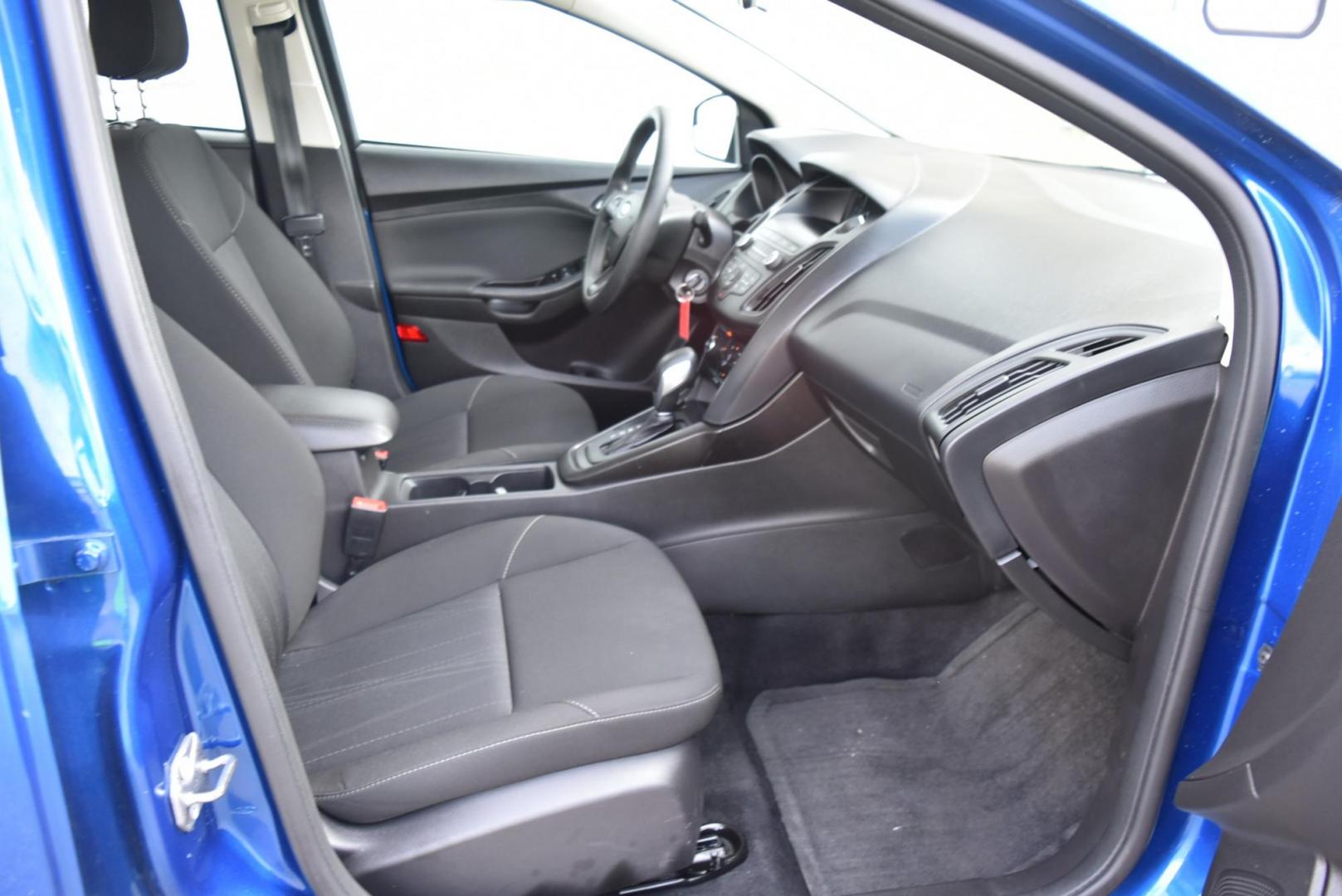 2018 Blue /Black Ford Focus SE (1FADP3F23JL) with an 2.0L L4 DOHC 16V engine, 6-Speed Automatic transmission, located at 1600 E Hwy 44, Rapid City, SD, 57703, (605) 716-7878, 44.070232, -103.171410 - Photo#10