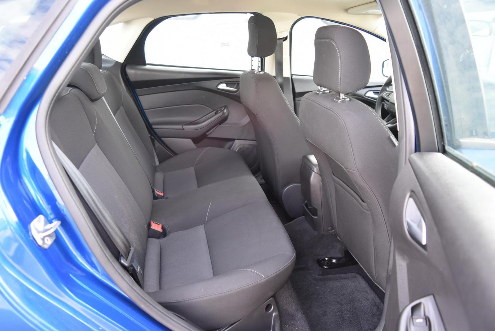 2018 Blue /Black Ford Focus SE (1FADP3F23JL) with an 2.0L L4 DOHC 16V engine, 6-Speed Automatic transmission, located at 1600 E Hwy 44, Rapid City, SD, 57703, (605) 716-7878, 44.070232, -103.171410 - Photo#11