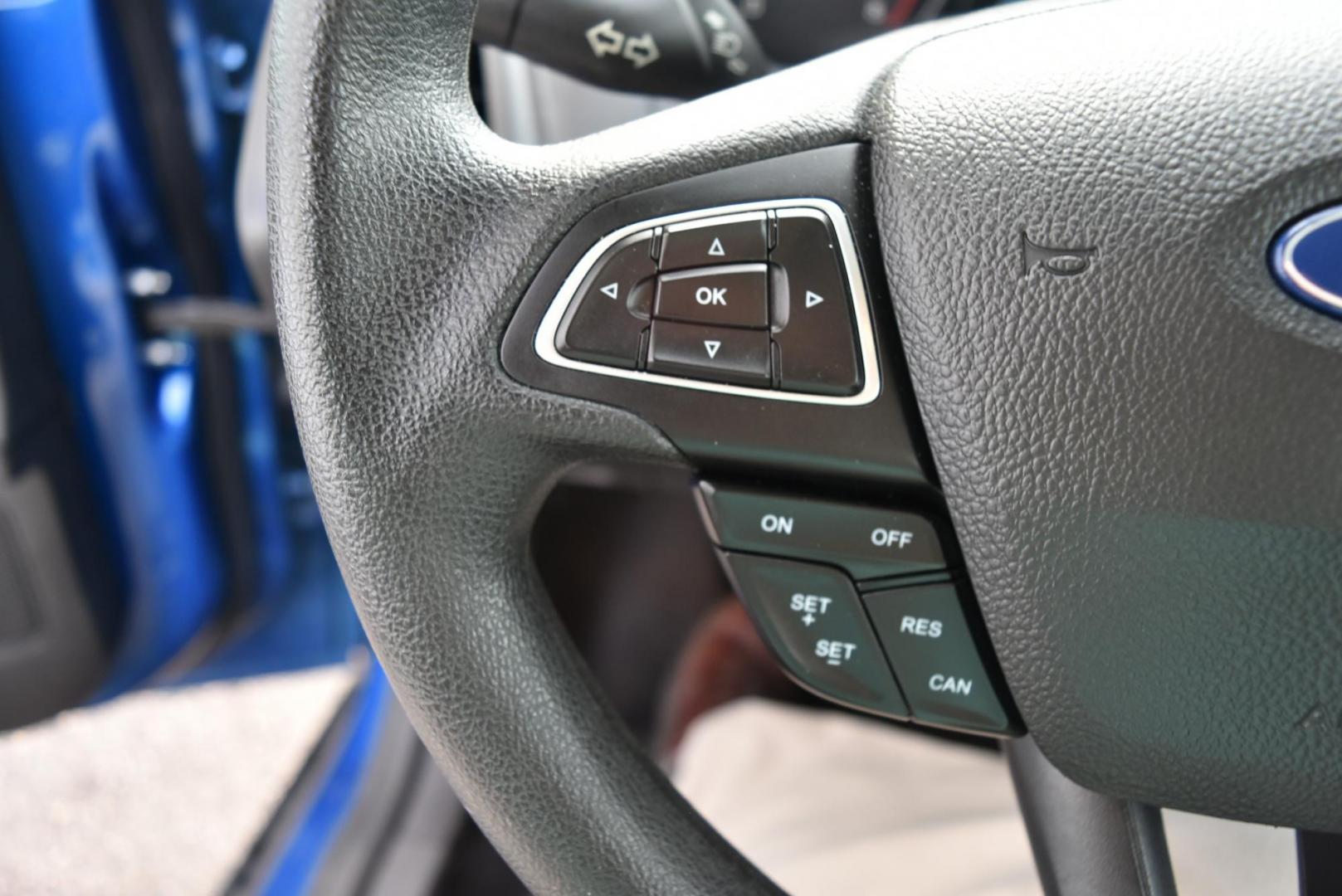 2018 Blue /Black Ford Focus SE (1FADP3F23JL) with an 2.0L L4 DOHC 16V engine, 6-Speed Automatic transmission, located at 1600 E Hwy 44, Rapid City, SD, 57703, (605) 716-7878, 44.070232, -103.171410 - Photo#16