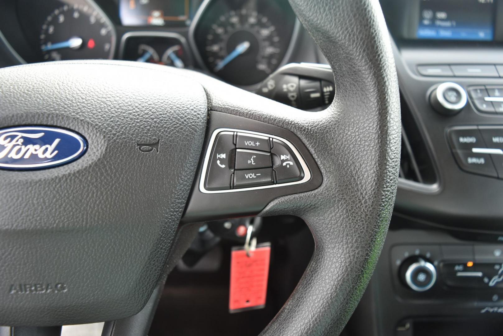 2018 Blue /Black Ford Focus SE (1FADP3F23JL) with an 2.0L L4 DOHC 16V engine, 6-Speed Automatic transmission, located at 1600 E Hwy 44, Rapid City, SD, 57703, (605) 716-7878, 44.070232, -103.171410 - Photo#17