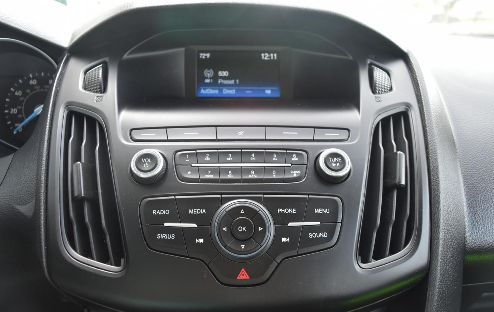 2018 Blue /Black Ford Focus SE (1FADP3F23JL) with an 2.0L L4 DOHC 16V engine, 6-Speed Automatic transmission, located at 1600 E Hwy 44, Rapid City, SD, 57703, (605) 716-7878, 44.070232, -103.171410 - Photo#19