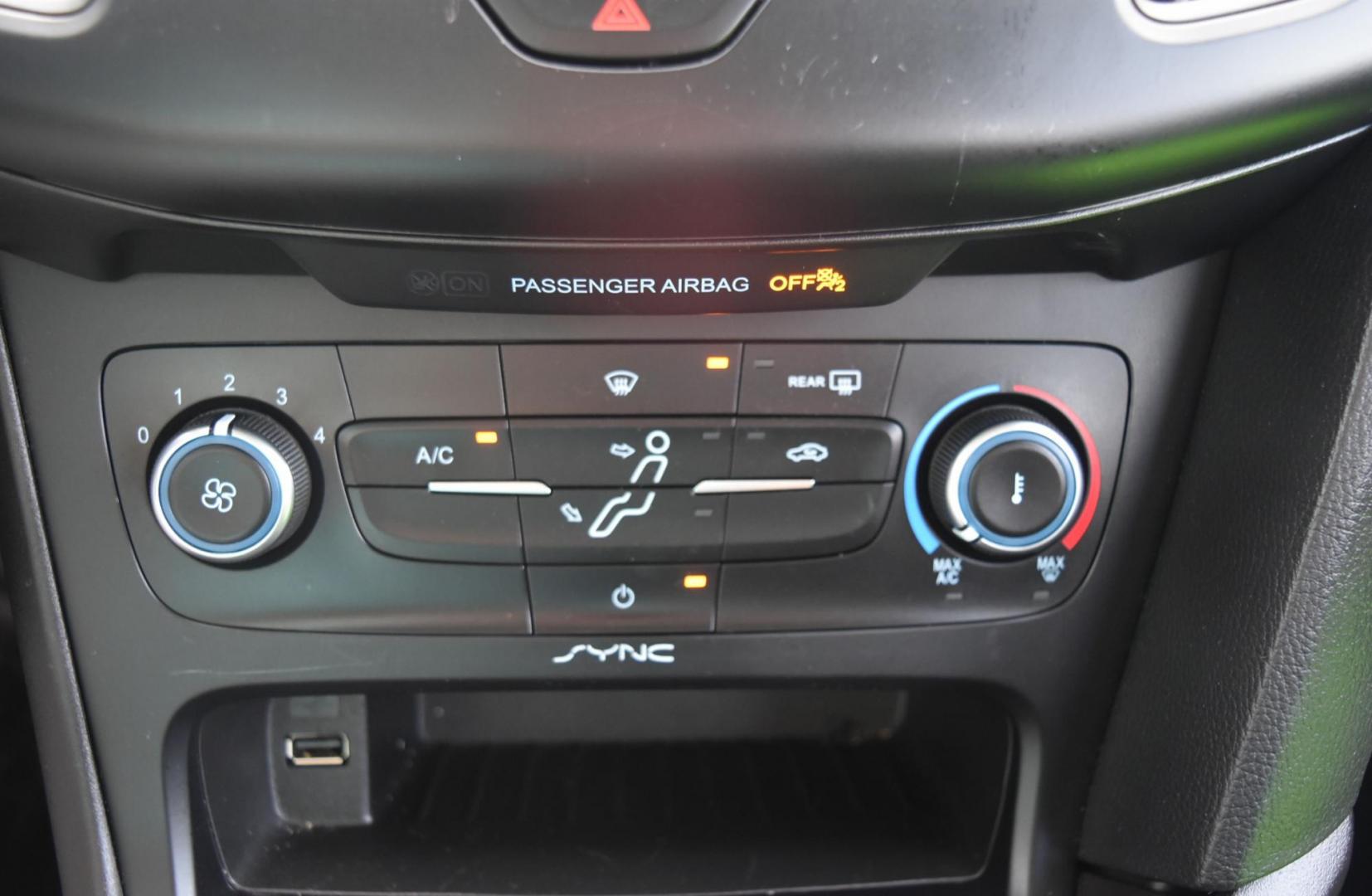 2018 Blue /Black Ford Focus SE (1FADP3F23JL) with an 2.0L L4 DOHC 16V engine, 6-Speed Automatic transmission, located at 1600 E Hwy 44, Rapid City, SD, 57703, (605) 716-7878, 44.070232, -103.171410 - Photo#21