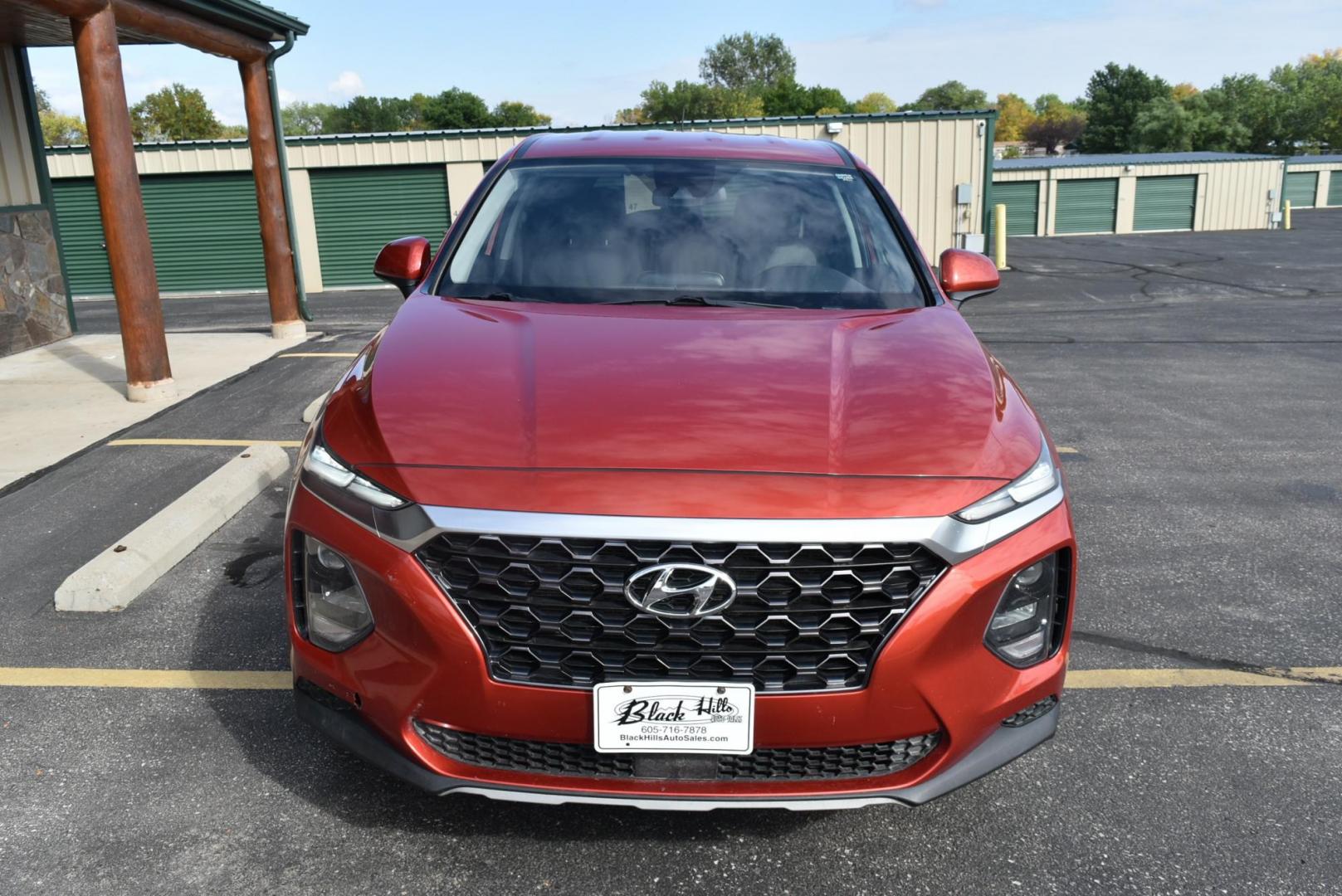 2020 Orange /Black Hyundai Santa Fe SE (5NMS2CAD7LH) with an 2.4L L4 DOHC 16V engine, 8-Speed Automatic w/ Overdrive transmission, located at 1600 E Hwy 44, Rapid City, SD, 57703, (605) 716-7878, 44.070232, -103.171410 - Photo#2