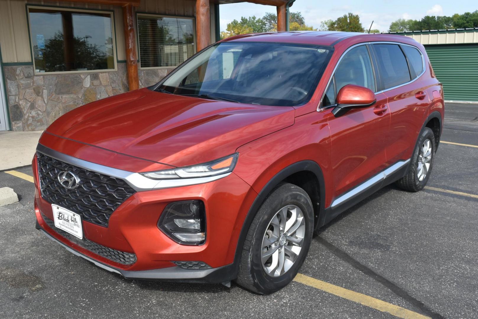 2020 Orange /Black Hyundai Santa Fe SE (5NMS2CAD7LH) with an 2.4L L4 DOHC 16V engine, 8-Speed Automatic w/ Overdrive transmission, located at 1600 E Hwy 44, Rapid City, SD, 57703, (605) 716-7878, 44.070232, -103.171410 - Photo#3