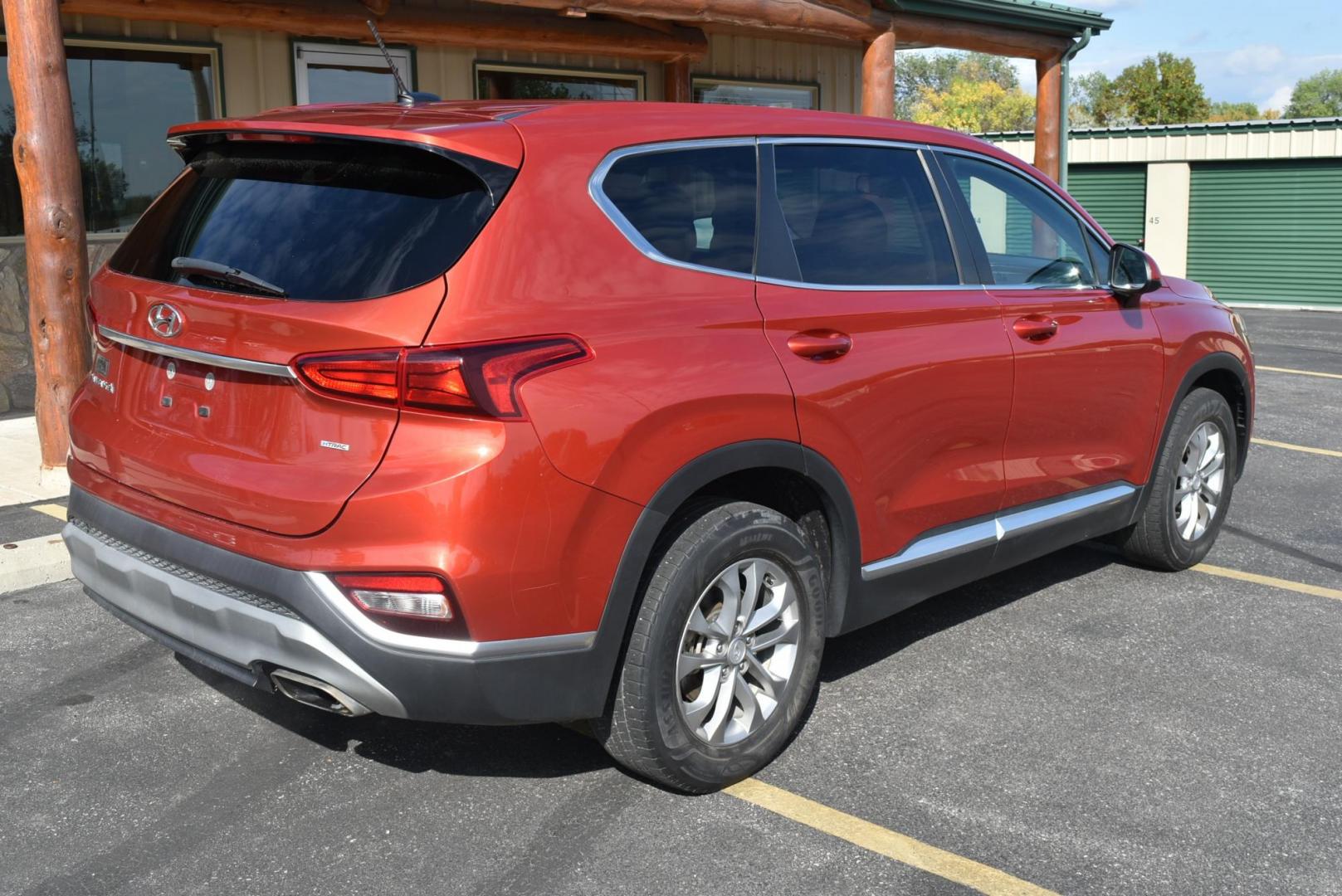 2020 Orange /Black Hyundai Santa Fe SE (5NMS2CAD7LH) with an 2.4L L4 DOHC 16V engine, 8-Speed Automatic w/ Overdrive transmission, located at 1600 E Hwy 44, Rapid City, SD, 57703, (605) 716-7878, 44.070232, -103.171410 - Photo#8