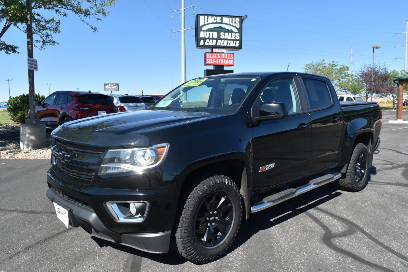 2019 Black /Black Chevrolet Colorado Z-71 (1GCGTDEN6K1) with an 3.6L DI DOHC V6 VVT engine, 8-Speed Automatic transmission, located at 1600 E Hwy 44, Rapid City, SD, 57703, (605) 716-7878, 44.070232, -103.171410 - Photo#0