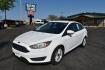 2018 White /black Ford Focus SE Sedan (1FADP3F23JL) with an 2.0L L4 DOHC 16V engine, located at 1600 E Hwy 44, Rapid City, SD, 57703, (605) 716-7878, 44.070232, -103.171410 - Photo#0