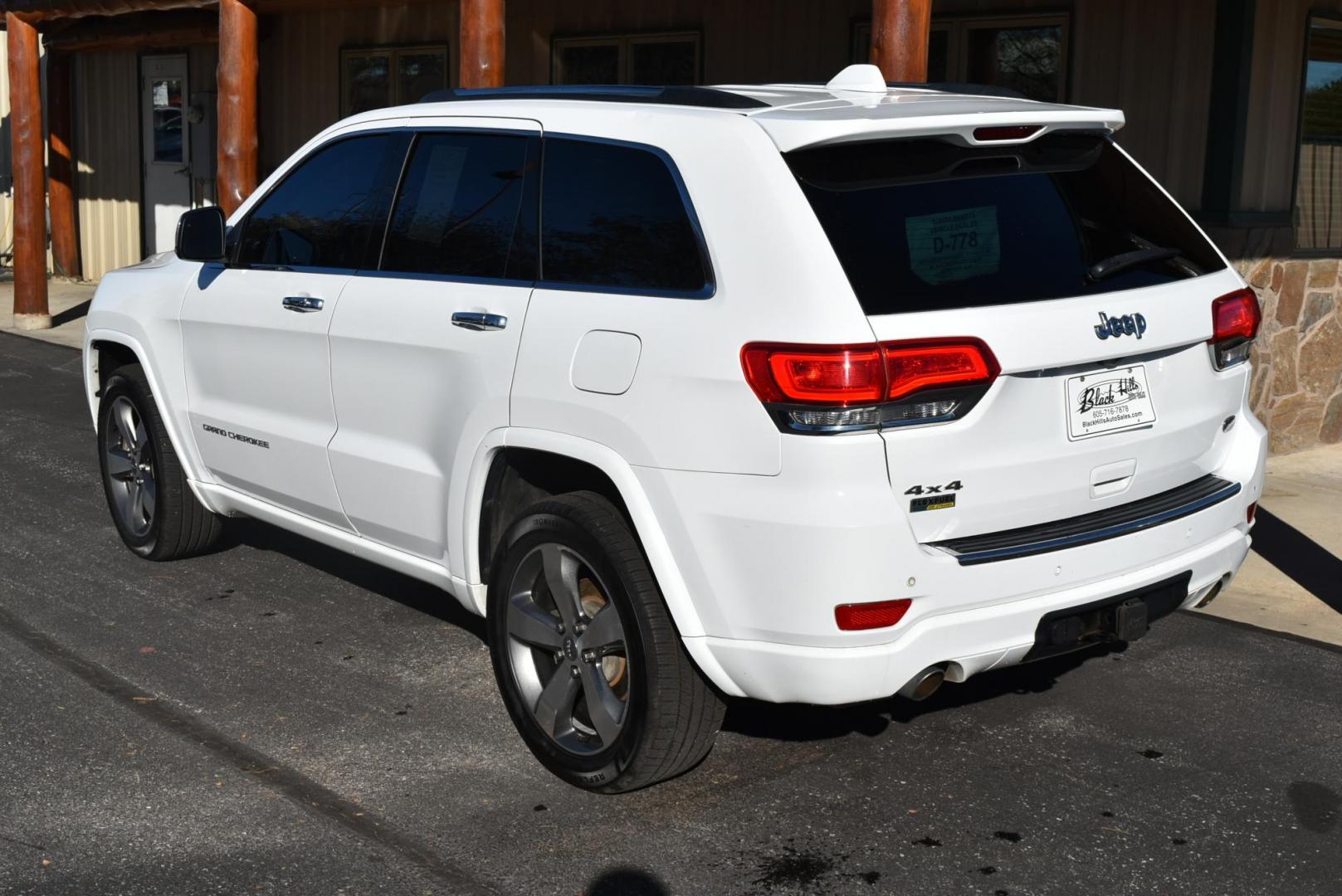 2015 White /Black Jeep Grand Cherokee Overland (1C4RJFCG8FC) with an 3.6L V6 DOHC 24V engine, 8-Speed Automatic transmission, located at 1600 E Hwy 44, Rapid City, SD, 57703, (605) 716-7878, 44.070232, -103.171410 - Photo#6