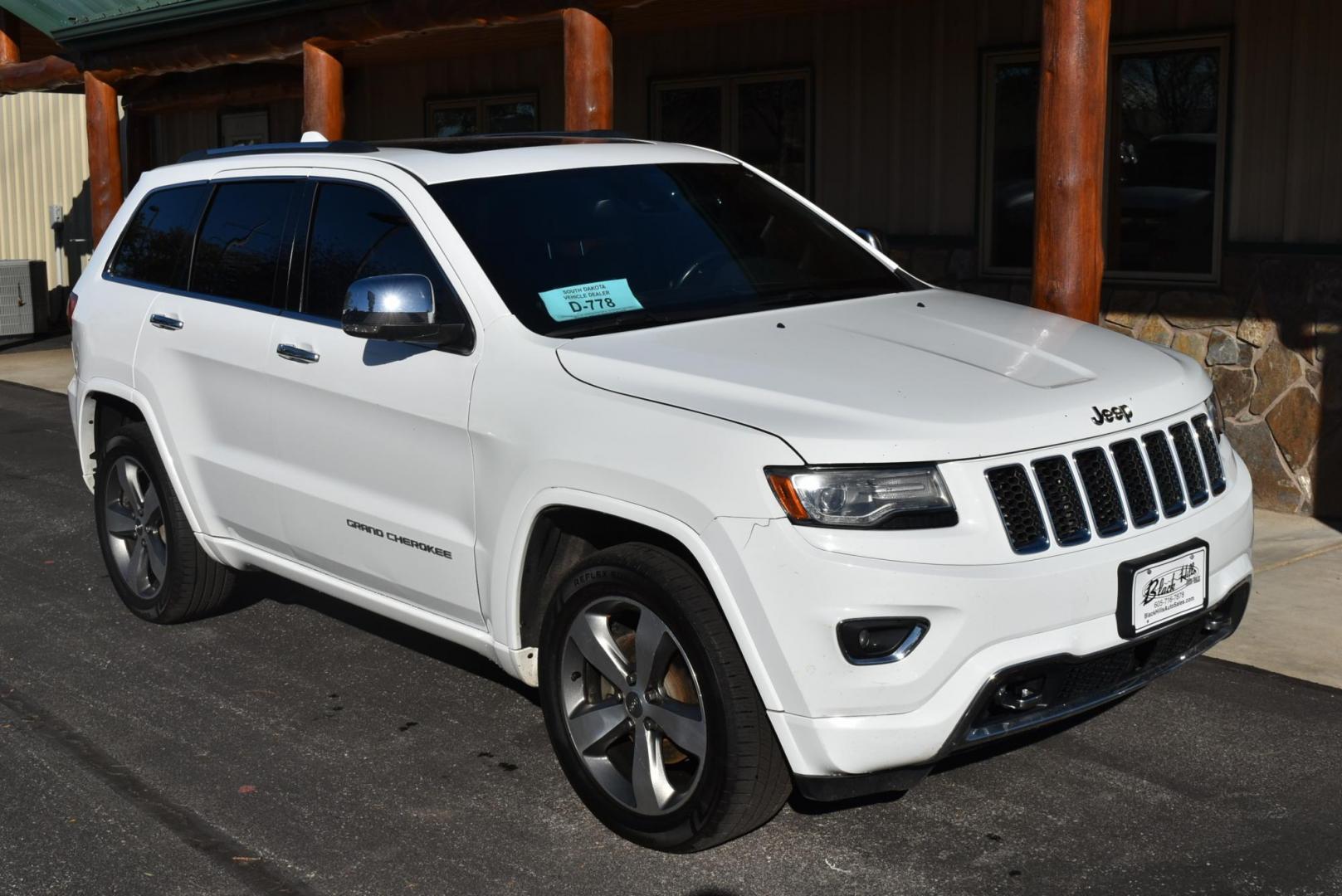 2015 White /Black Jeep Grand Cherokee Overland (1C4RJFCG8FC) with an 3.6L V6 DOHC 24V engine, 8-Speed Automatic transmission, located at 1600 E Hwy 44, Rapid City, SD, 57703, (605) 716-7878, 44.070232, -103.171410 - Photo#1