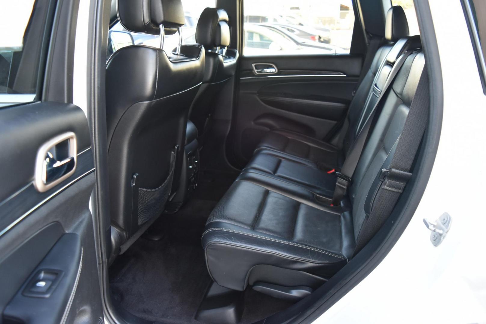 2015 White /Black Jeep Grand Cherokee Overland (1C4RJFCG8FC) with an 3.6L V6 DOHC 24V engine, 8-Speed Automatic transmission, located at 1600 E Hwy 44, Rapid City, SD, 57703, (605) 716-7878, 44.070232, -103.171410 - Photo#12