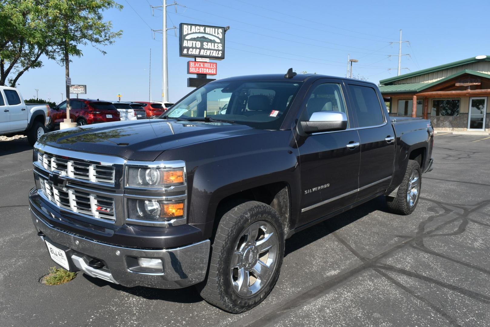 2015 Purple /Gray Chevrolet Silverado 1500 LTZ Crew Cab 4WD (3GCUKSEJ8FG) with an 6.2L V8 OHV 16V engine, 6-Speed Automatic transmission, located at 1600 E Hwy 44, Rapid City, SD, 57703, (605) 716-7878, 44.070232, -103.171410 - Photo#0
