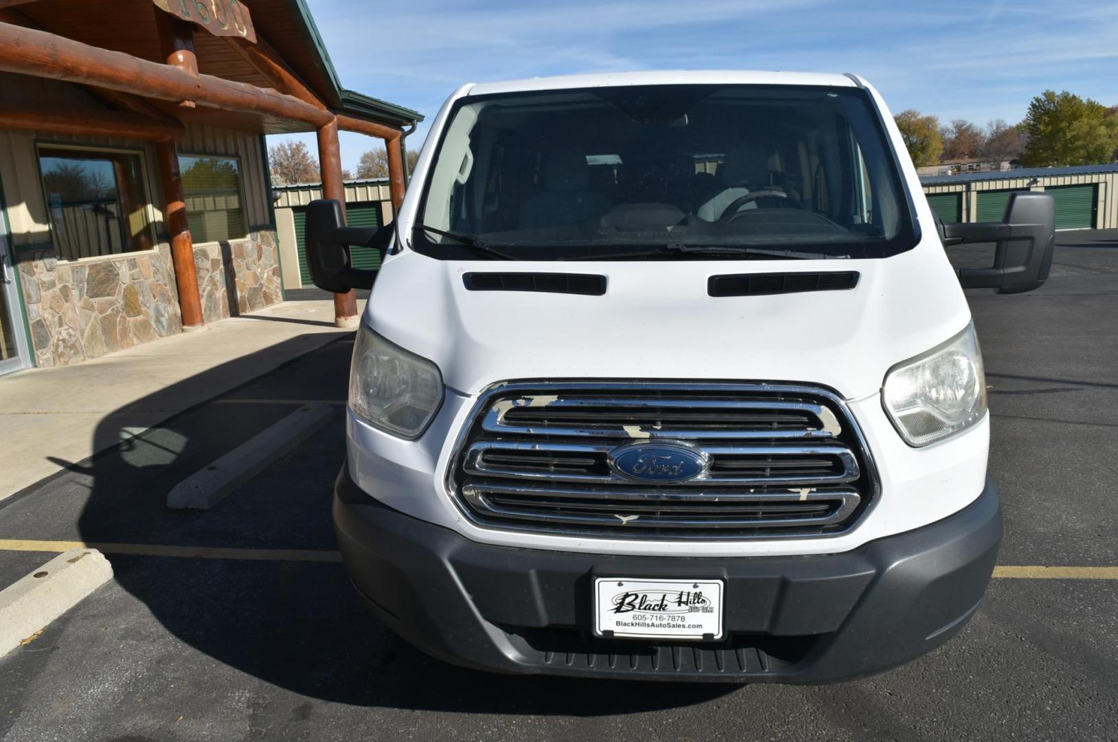 2016 White /Dark Gray Ford Transit 350 Wagon Low Roof XLT w/Sliding Pass. 148-in. WB (1FBZX2YG2GK) with an 3.5L ECOBOOST V6 engine, 6-Speed Automatic w/OD & Selectshift transmission, located at 1600 E Hwy 44, Rapid City, SD, 57703, (605) 716-7878, 44.070232, -103.171410 - Photo#2