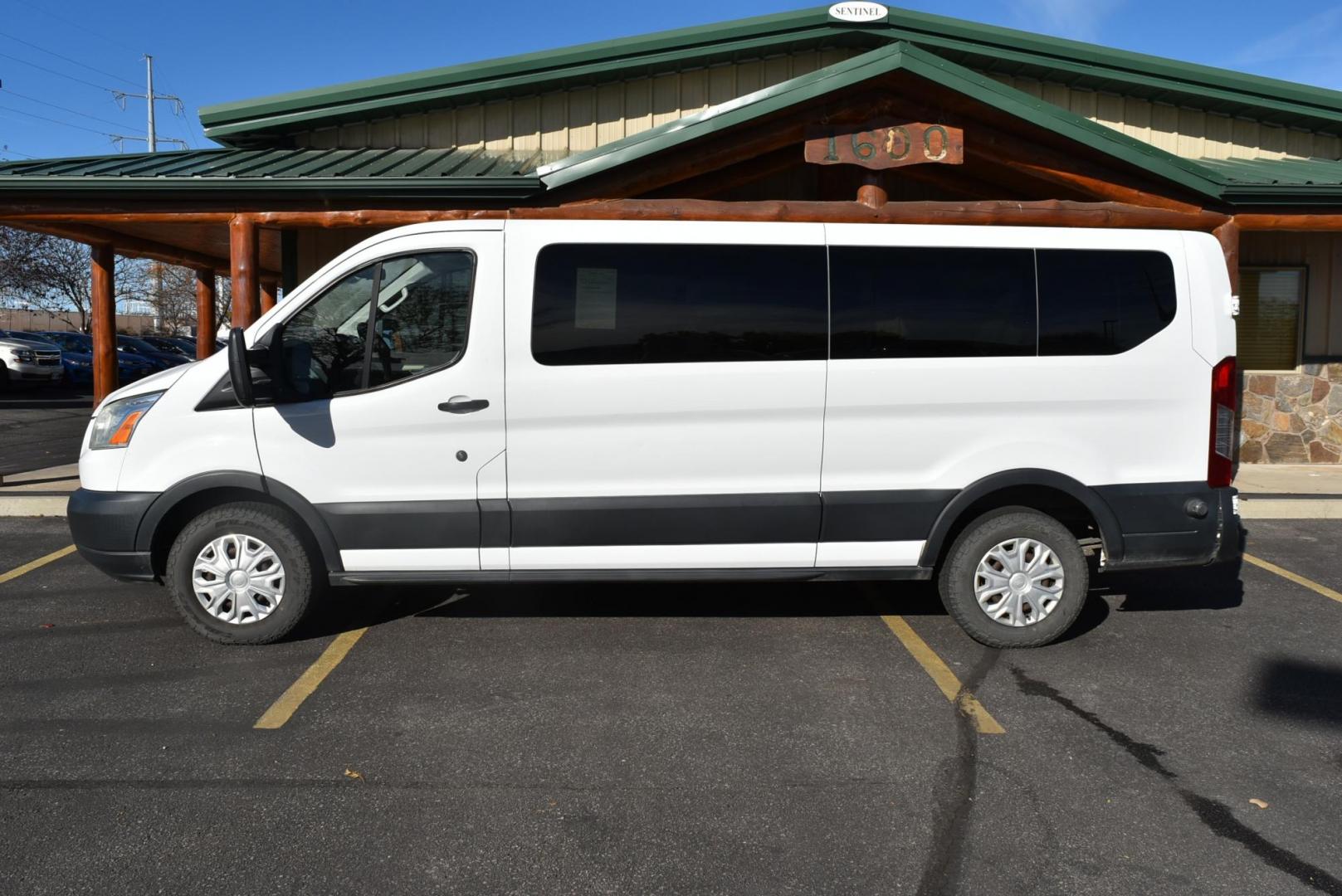2016 White /Dark Gray Ford Transit 350 Wagon Low Roof XLT w/Sliding Pass. 148-in. WB (1FBZX2YG2GK) with an 3.5L ECOBOOST V6 engine, 6-Speed Automatic w/OD & Selectshift transmission, located at 1600 E Hwy 44, Rapid City, SD, 57703, (605) 716-7878, 44.070232, -103.171410 - Photo#4
