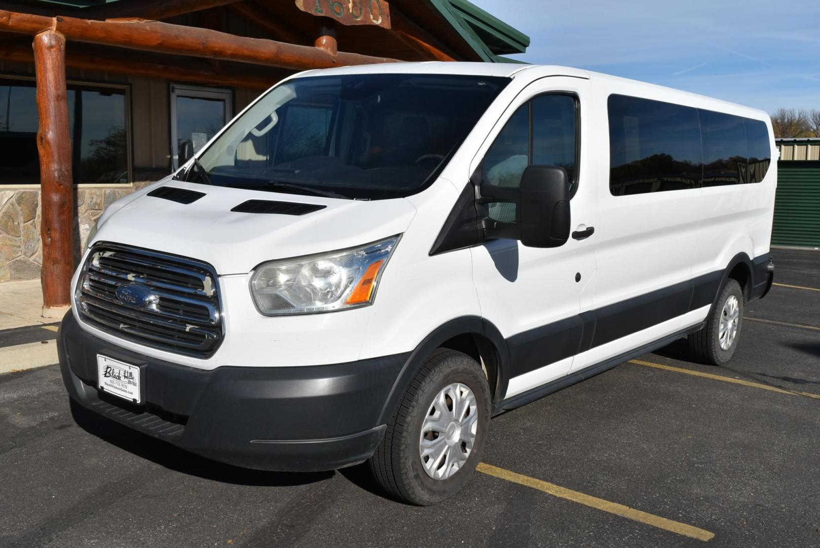 2016 White /Dark Gray Ford Transit 350 Wagon Low Roof XLT w/Sliding Pass. 148-in. WB (1FBZX2YG2GK) with an 3.5L ECOBOOST V6 engine, 6-Speed Automatic w/OD & Selectshift transmission, located at 1600 E Hwy 44, Rapid City, SD, 57703, (605) 716-7878, 44.070232, -103.171410 - Photo#3