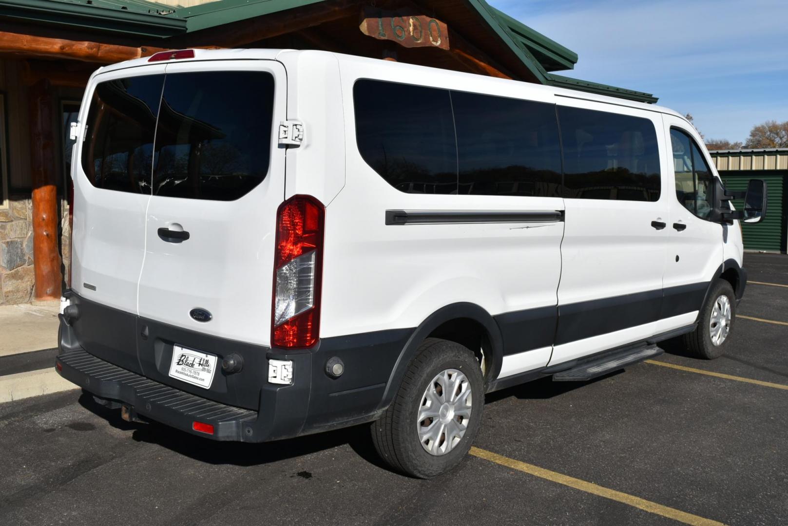 2016 White /Dark Gray Ford Transit 350 Wagon Low Roof XLT w/Sliding Pass. 148-in. WB (1FBZX2YG2GK) with an 3.5L ECOBOOST V6 engine, 6-Speed Automatic w/OD & Selectshift transmission, located at 1600 E Hwy 44, Rapid City, SD, 57703, (605) 716-7878, 44.070232, -103.171410 - Photo#8
