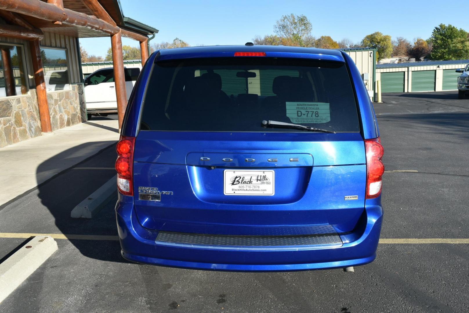 2013 Blue /Black Dodge Grand Caravan SE (2C4RDGBG6DR) with an 3.6L V6 DOHC 24V engine, 6-Speed Automatic - w/ OD transmission, located at 1600 E Hwy 44, Rapid City, SD, 57703, (605) 716-7878, 44.070232, -103.171410 - Photo#7