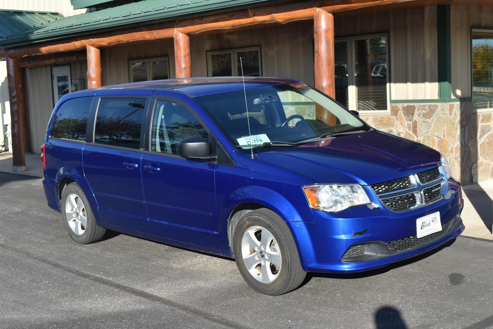 2013 Blue /Black Dodge Grand Caravan SE (2C4RDGBG6DR) with an 3.6L V6 DOHC 24V engine, 6-Speed Automatic - w/ OD transmission, located at 1600 E Hwy 44, Rapid City, SD, 57703, (605) 716-7878, 44.070232, -103.171410 - Photo#1