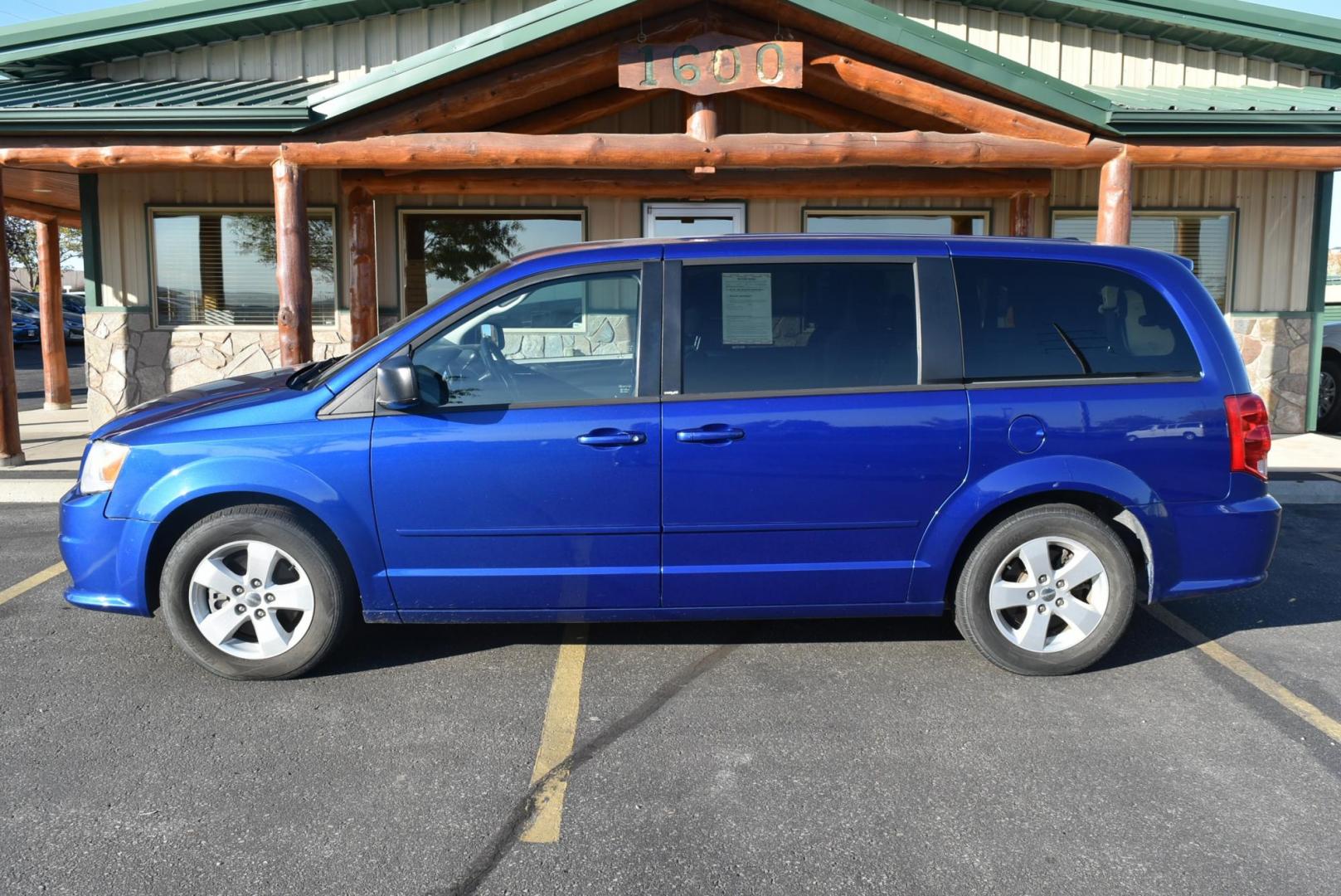 2013 Blue /Black Dodge Grand Caravan SE (2C4RDGBG6DR) with an 3.6L V6 DOHC 24V engine, 6-Speed Automatic - w/ OD transmission, located at 1600 E Hwy 44, Rapid City, SD, 57703, (605) 716-7878, 44.070232, -103.171410 - Photo#4
