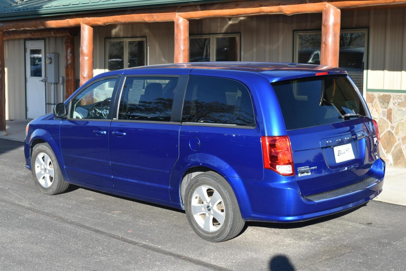 2013 Blue /Black Dodge Grand Caravan SE (2C4RDGBG6DR) with an 3.6L V6 DOHC 24V engine, 6-Speed Automatic - w/ OD transmission, located at 1600 E Hwy 44, Rapid City, SD, 57703, (605) 716-7878, 44.070232, -103.171410 - Photo#8