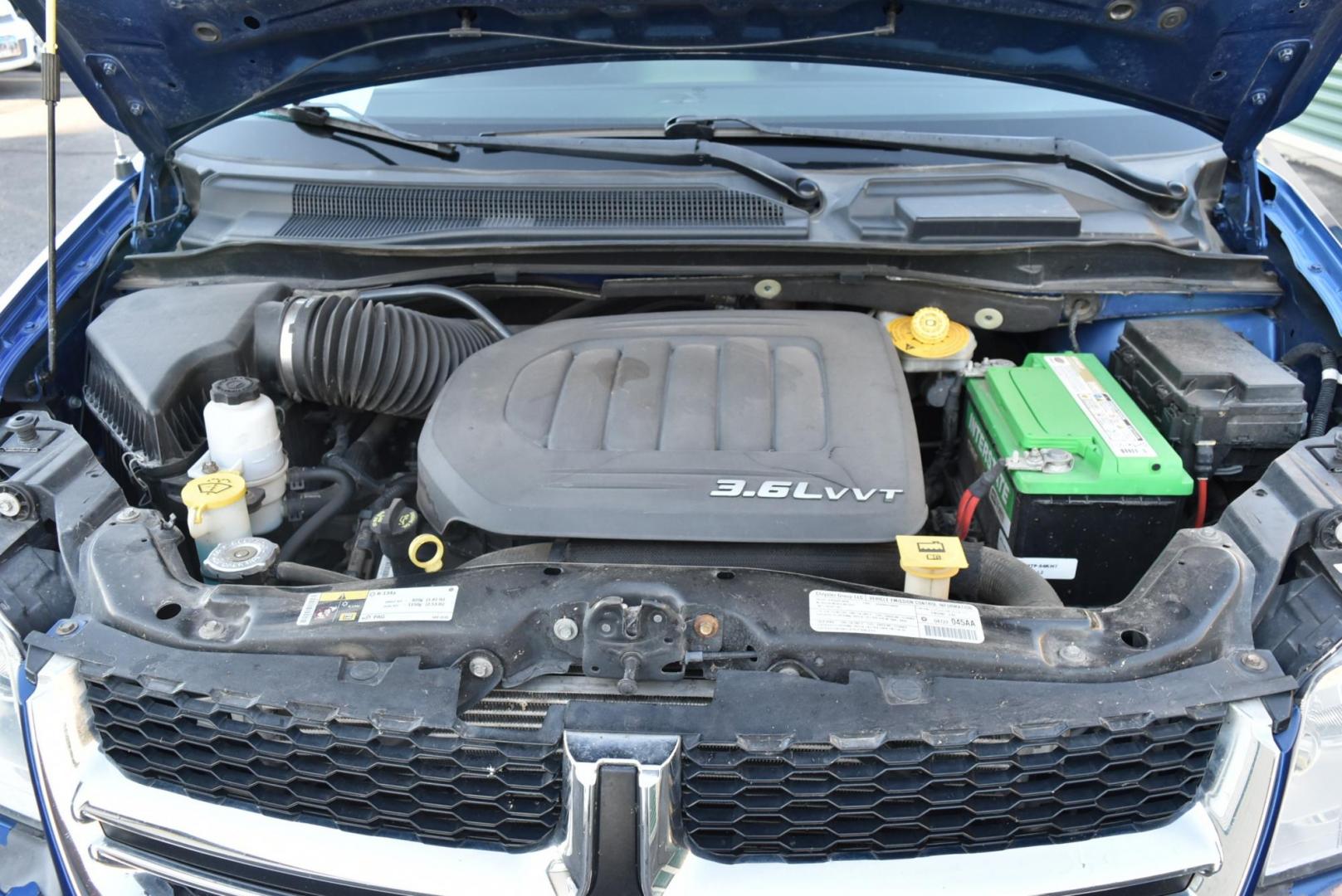 2013 Blue /Black Dodge Grand Caravan SE (2C4RDGBG6DR) with an 3.6L V6 DOHC 24V engine, 6-Speed Automatic - w/ OD transmission, located at 1600 E Hwy 44, Rapid City, SD, 57703, (605) 716-7878, 44.070232, -103.171410 - Photo#28