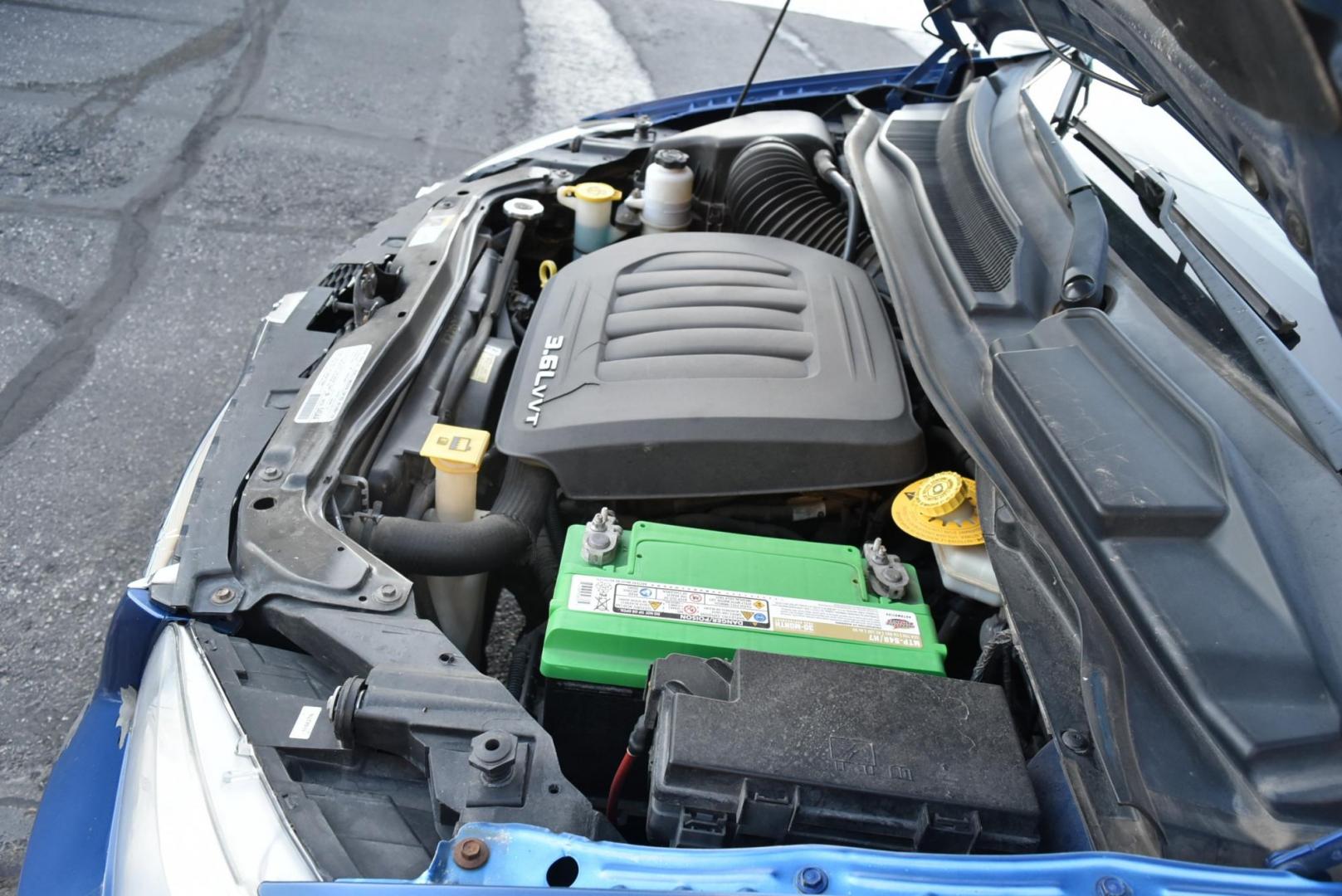 2013 Blue /Black Dodge Grand Caravan SE (2C4RDGBG6DR) with an 3.6L V6 DOHC 24V engine, 6-Speed Automatic - w/ OD transmission, located at 1600 E Hwy 44, Rapid City, SD, 57703, (605) 716-7878, 44.070232, -103.171410 - Photo#29